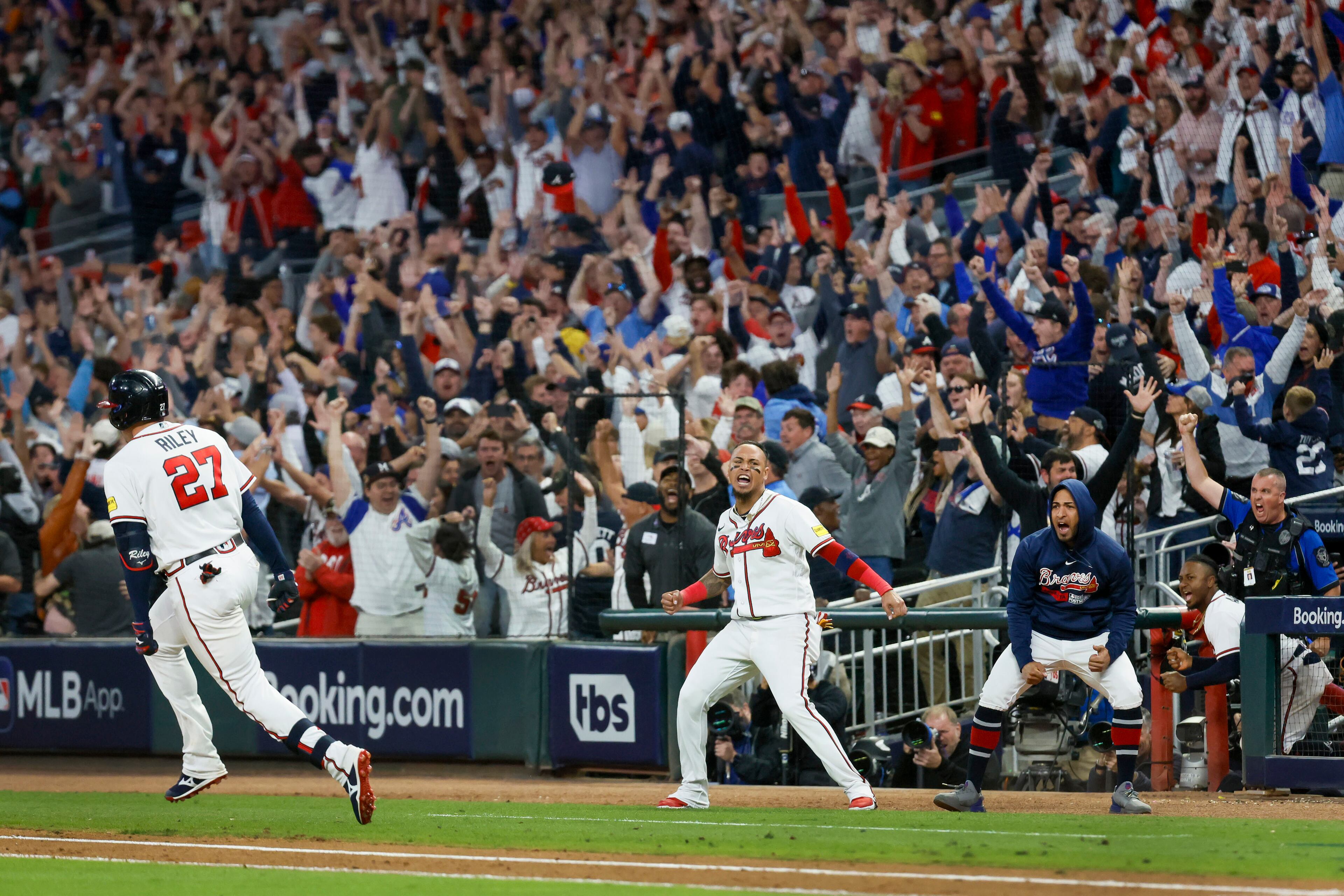 Atlanta Braves’ Austin Riley (27) hits a two-run home run against the Philadelphia Phillies during the eighth inning of NLDS Game 2 in Atlanta on Monday, Oct. 9, 2023. (Miguel Martinez / Miguel.Martinezjimenez@ajc.com)
