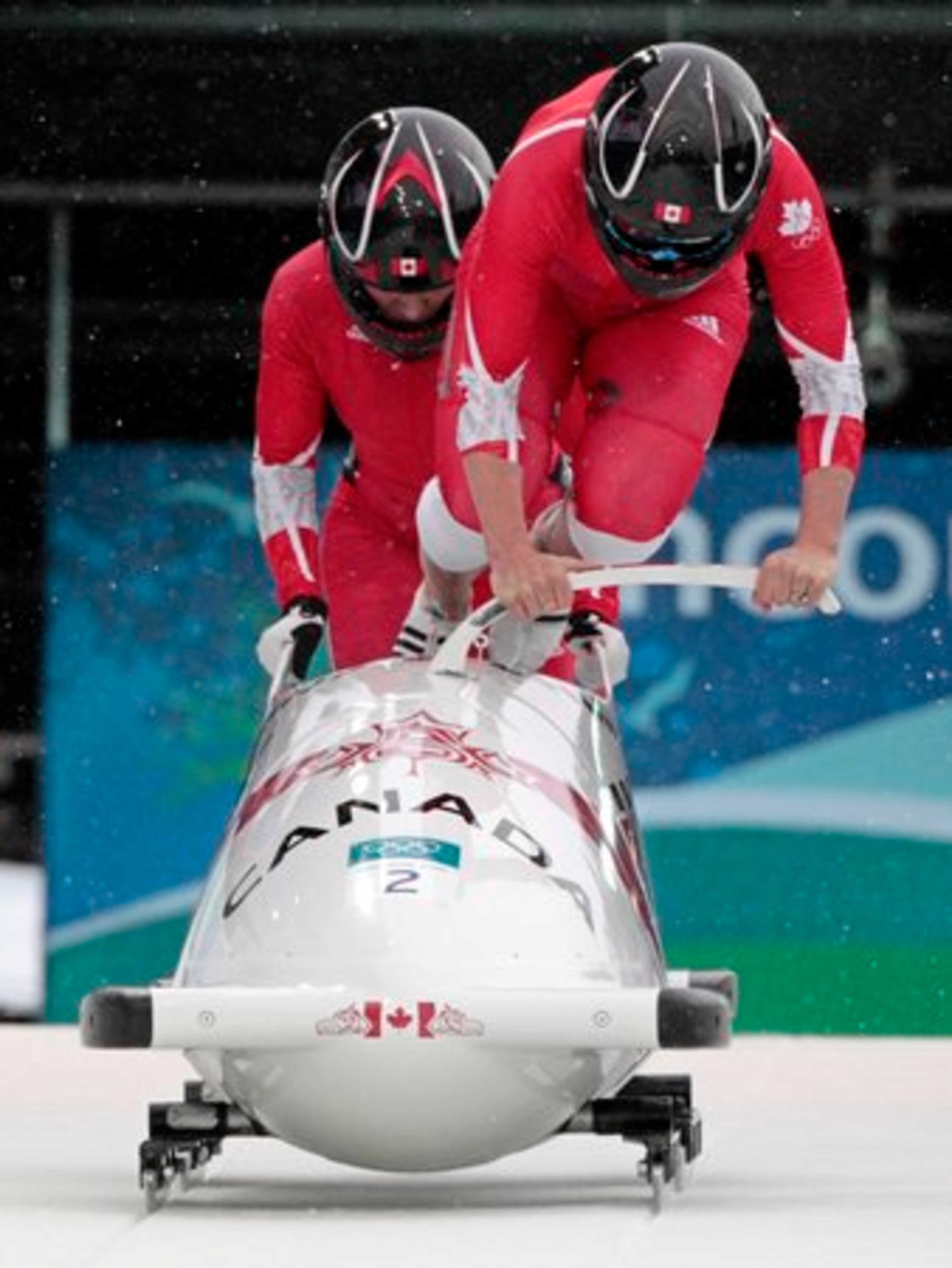 Canada's CAN-1, piloted by Kaillie Humphries, front, with brakeman Heather Moyse.