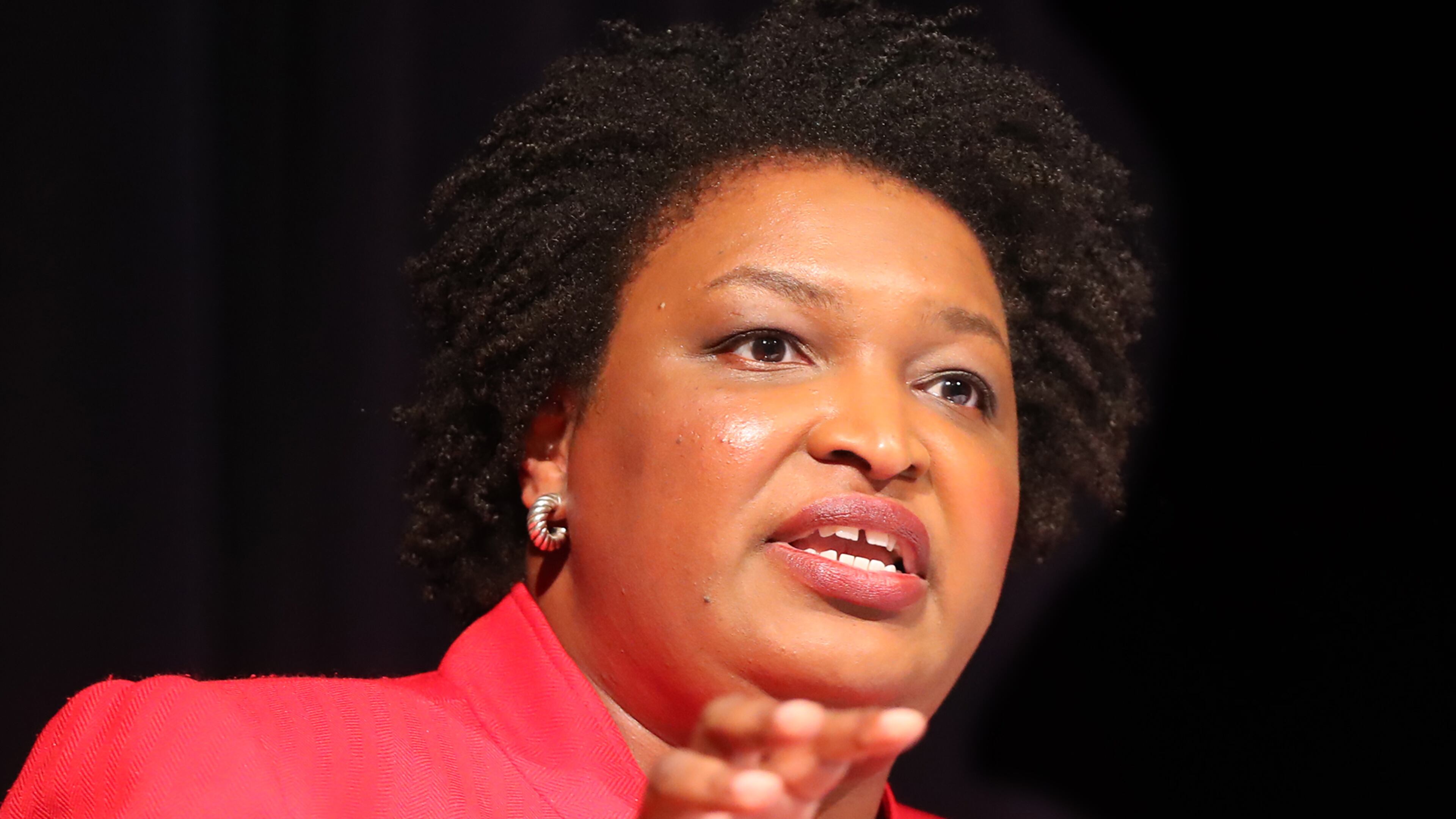 Democrat Stacey Abrams answers a debate question during a forum. Curtis Compton/ccompton@ajc.com