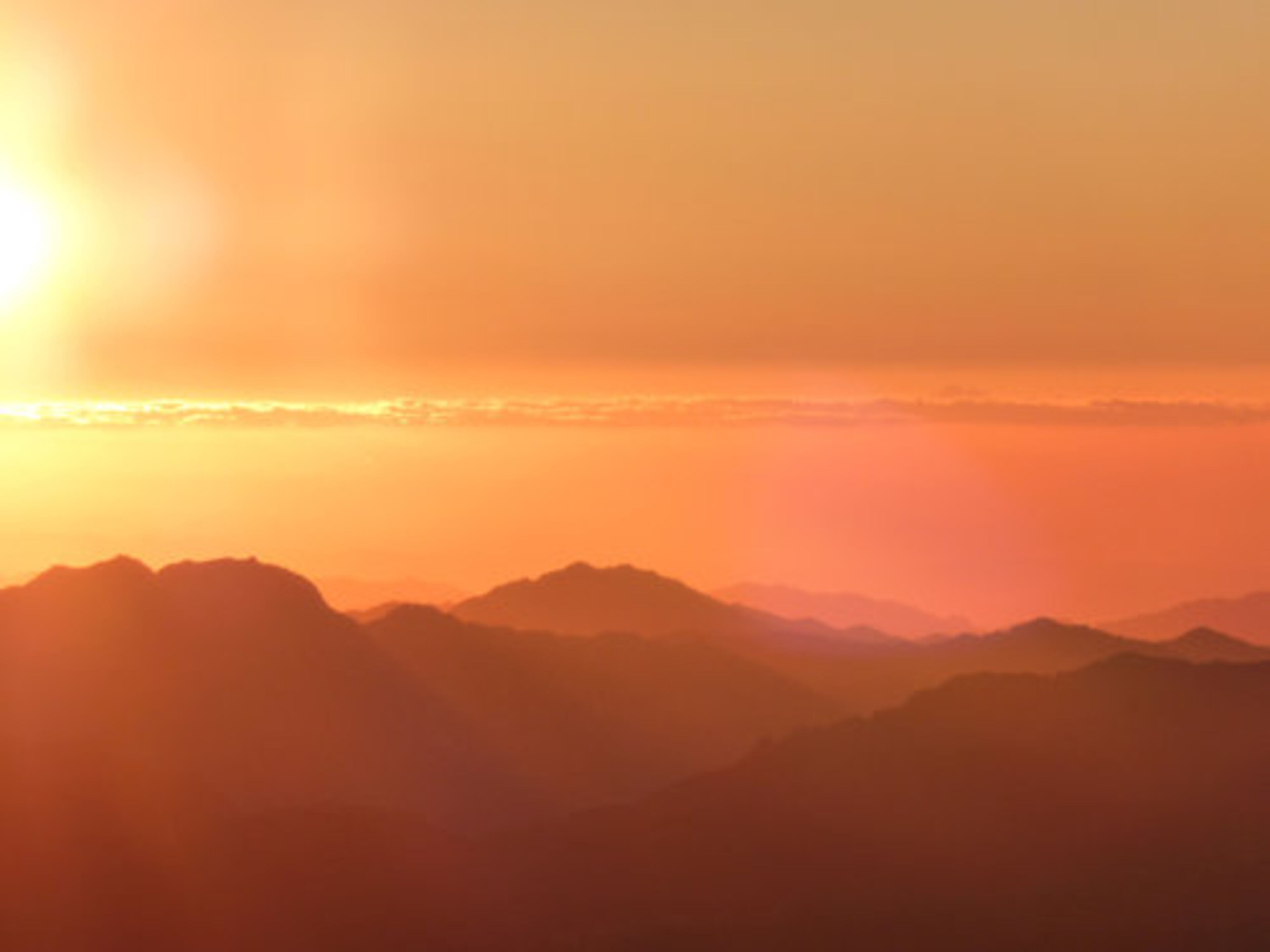 Morning hikers can be greeted with spectacular sunrises as seen from atop Mount Sinai in Egypt.