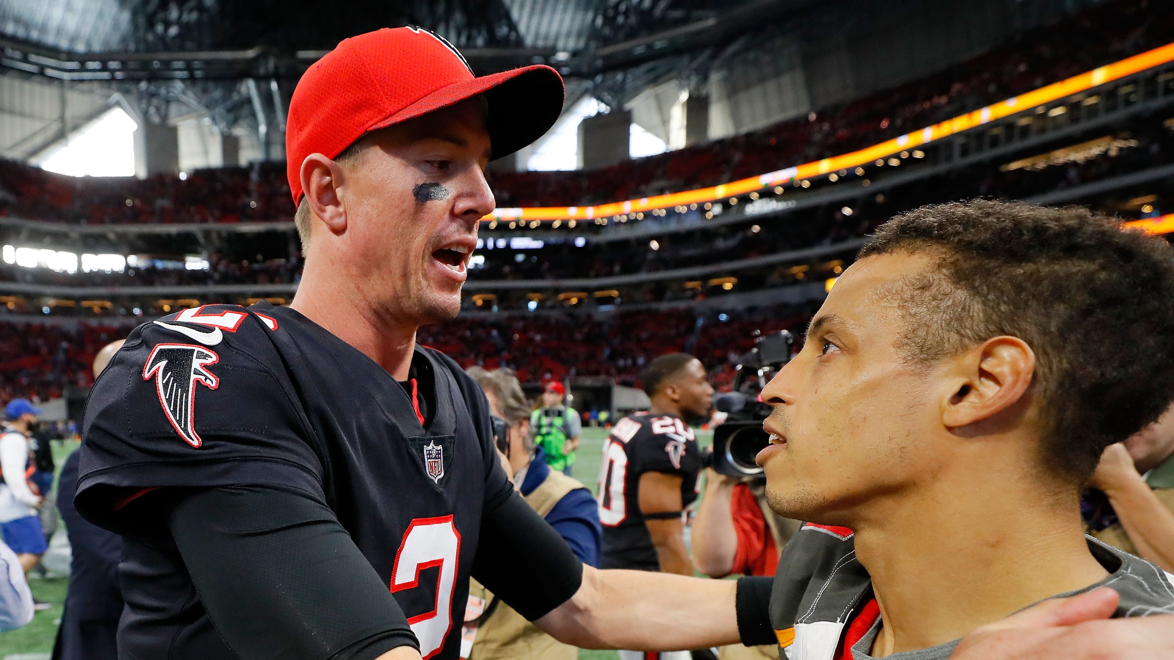 Falcons quarterback Matt Ryan made no attempt to sell former teammate Brent Grimes any Falcons jersey as the two exchanged pleasantries after Sunday's game in Mercedes-Benz Stadium, but Ryan recently went under disguise to try and sell the jerseys of his backup, Matt Schaub.