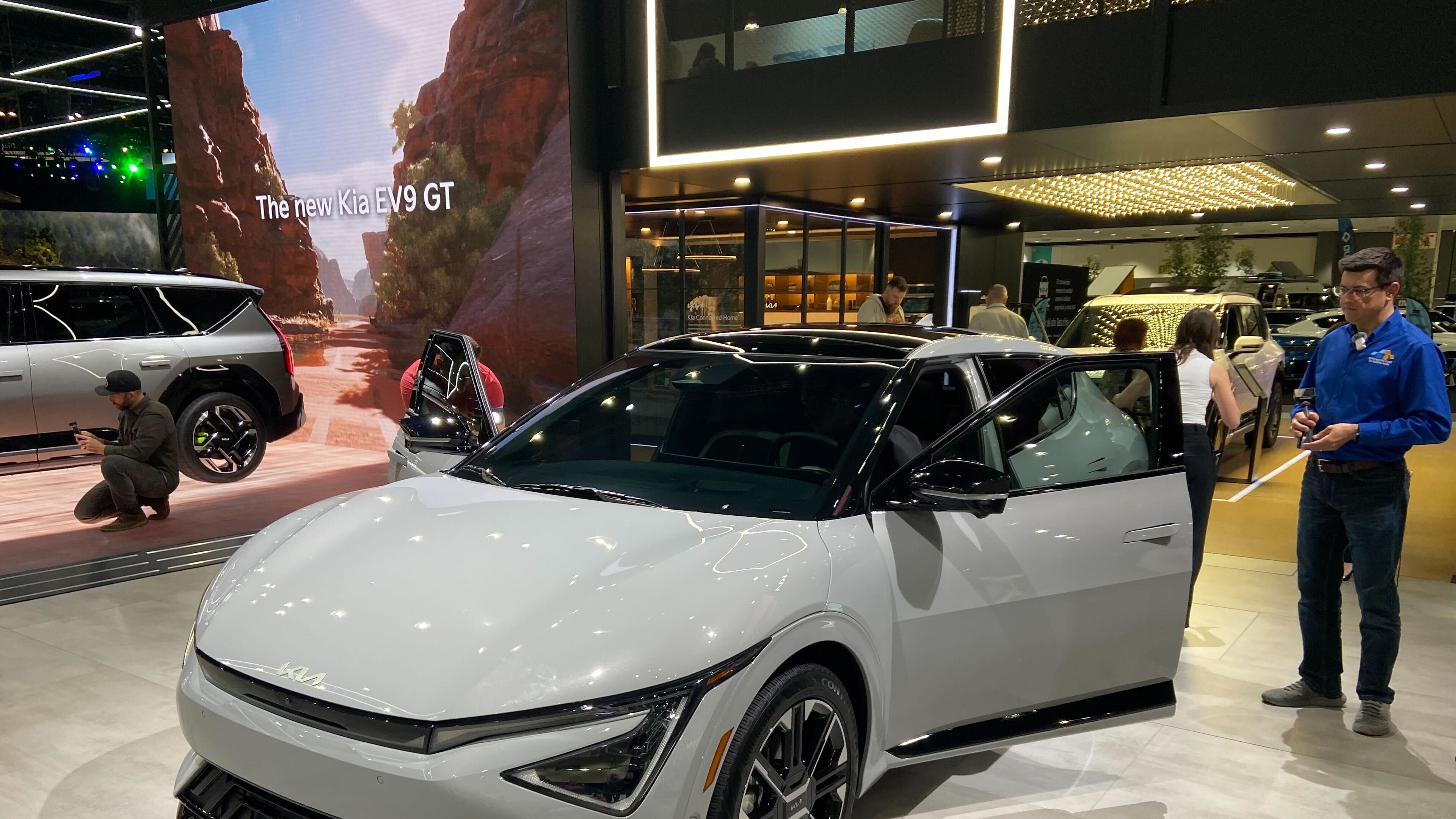 The 2025 Kia EV6 is displayed on the floor of the Los Angeles Auto Show. (Zachary Hansen/AJC)