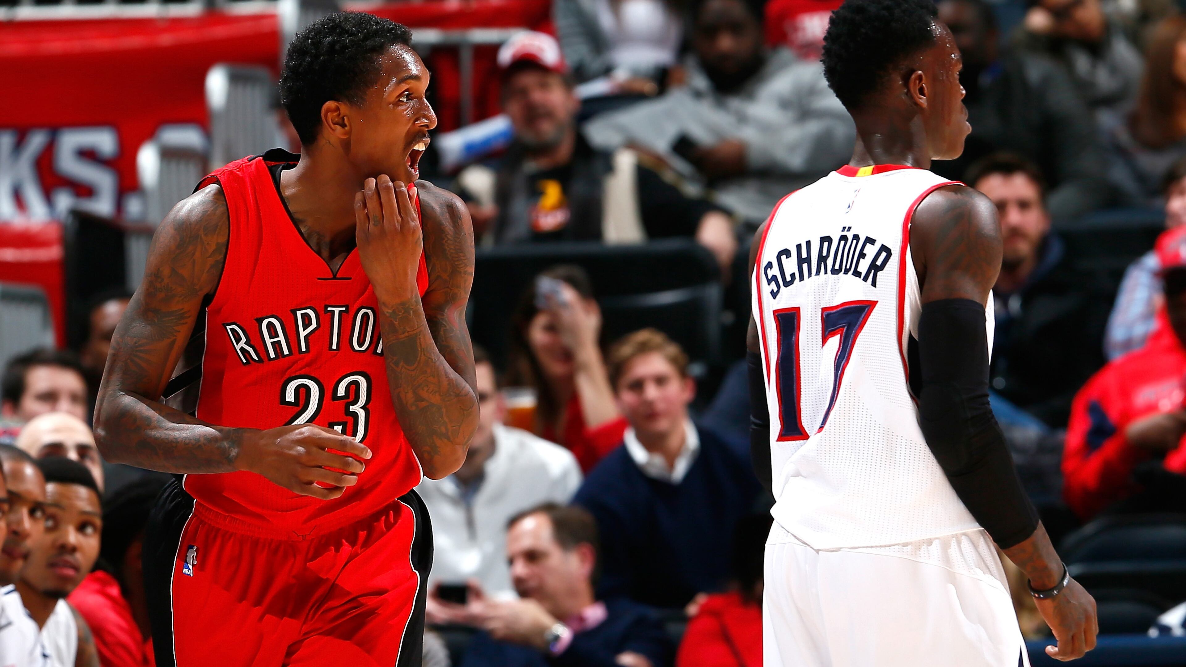 ATLANTA, GA - FEBRUARY 20: Louis Williams #23 of the Toronto Raptors reacts after hitting a three-point basket against Dennis Schroder #17 of the Atlanta Hawks at Philips Arena on February 20, 2015 in Atlanta, Georgia. NOTE TO USER: User expressly acknowledges and agrees that, by downloading and or using this photograph, User is consenting to the terms and conditions of the Getty Images License Agreement. (Photo by Kevin C. Cox/Getty Images)