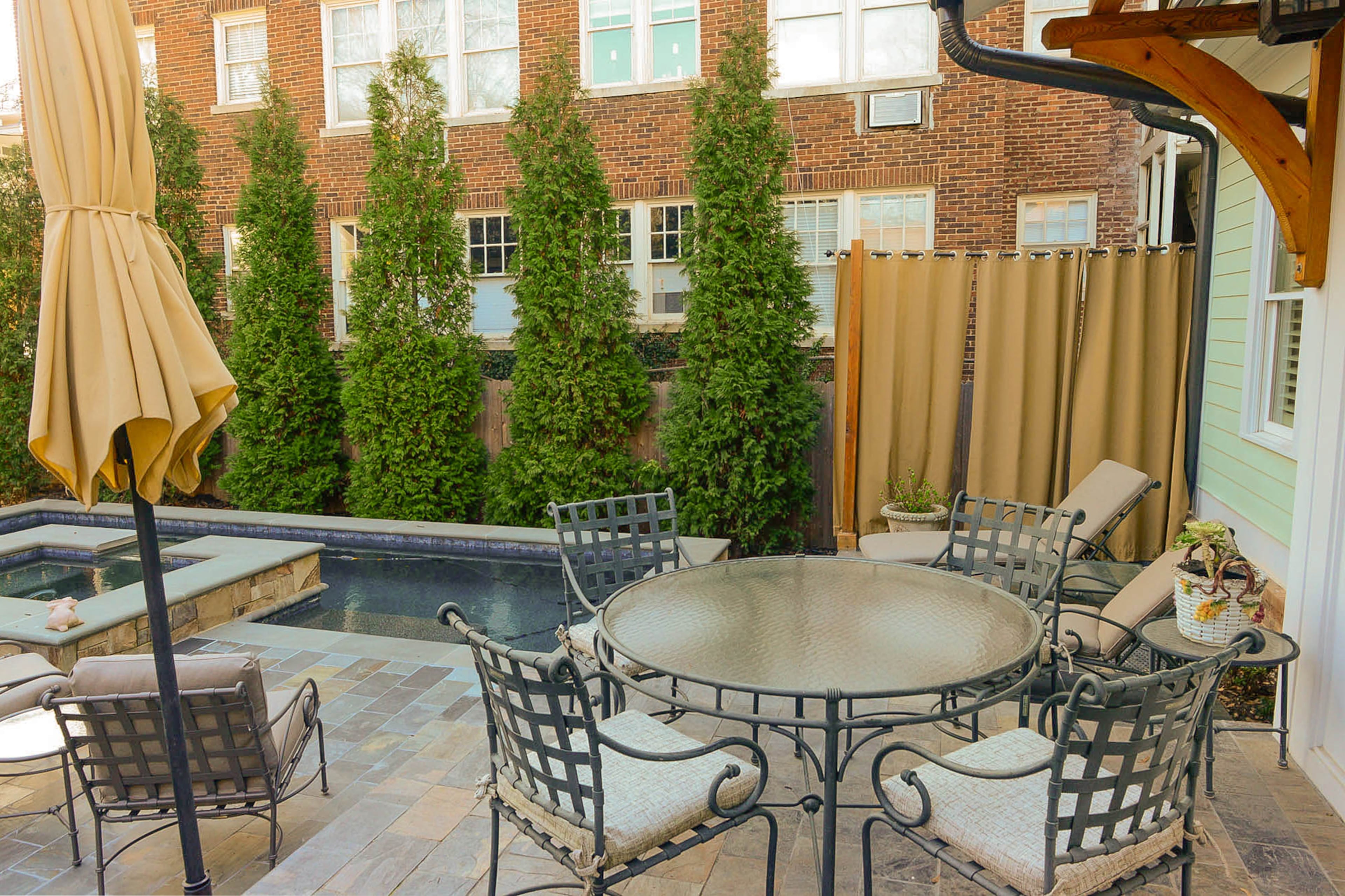 When the Halwigs rebuilt their historic 1916 house, they added a patio and in-ground pool. "They serve as a quiet calm oasis within the active Midtown area," Halwig said.