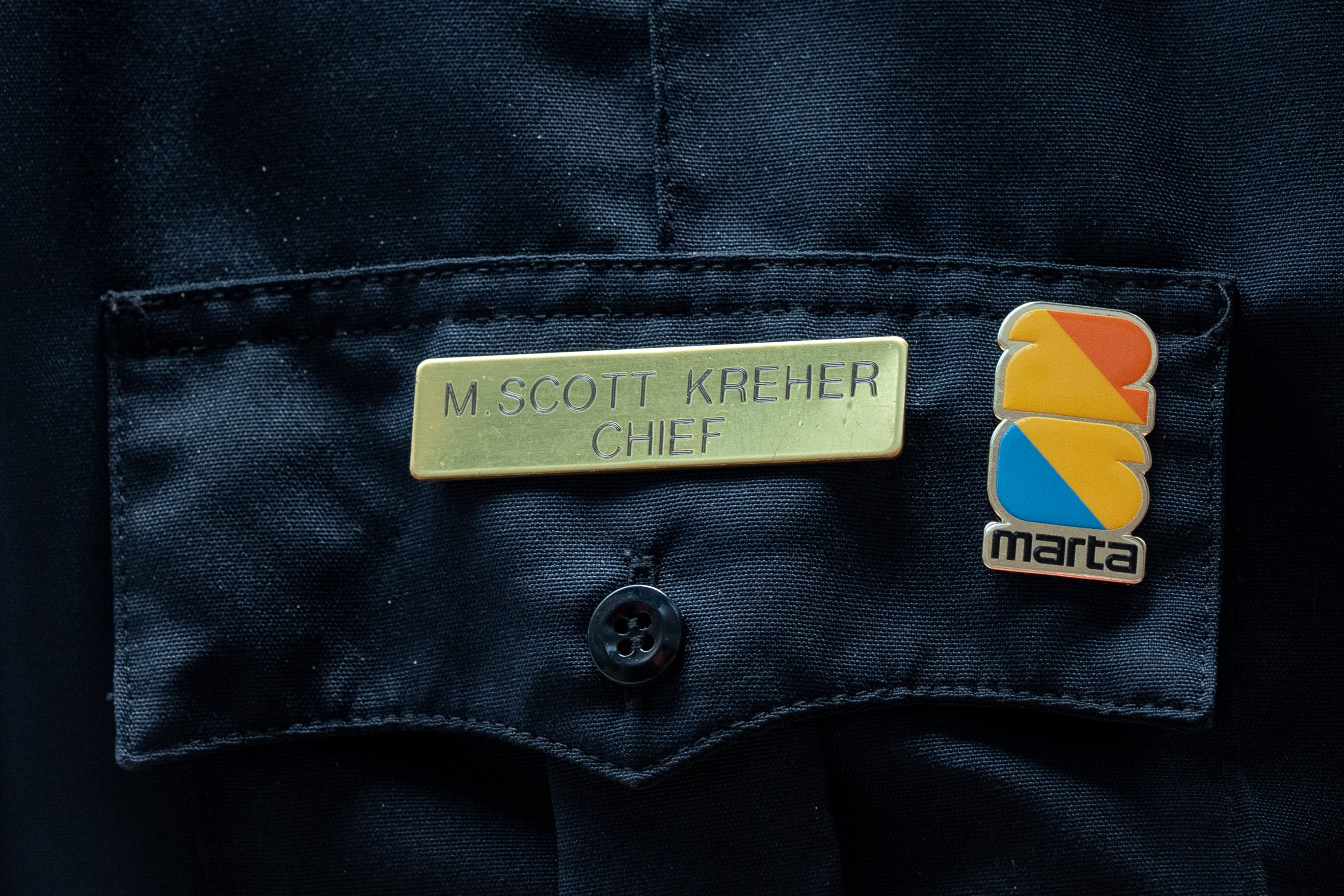MARTA police Chief Scott Kreher's uniform name plate and FIFA 2026 MARTA pin on Saturday, June 6, 2026. (Ben Hendren for the AJC)