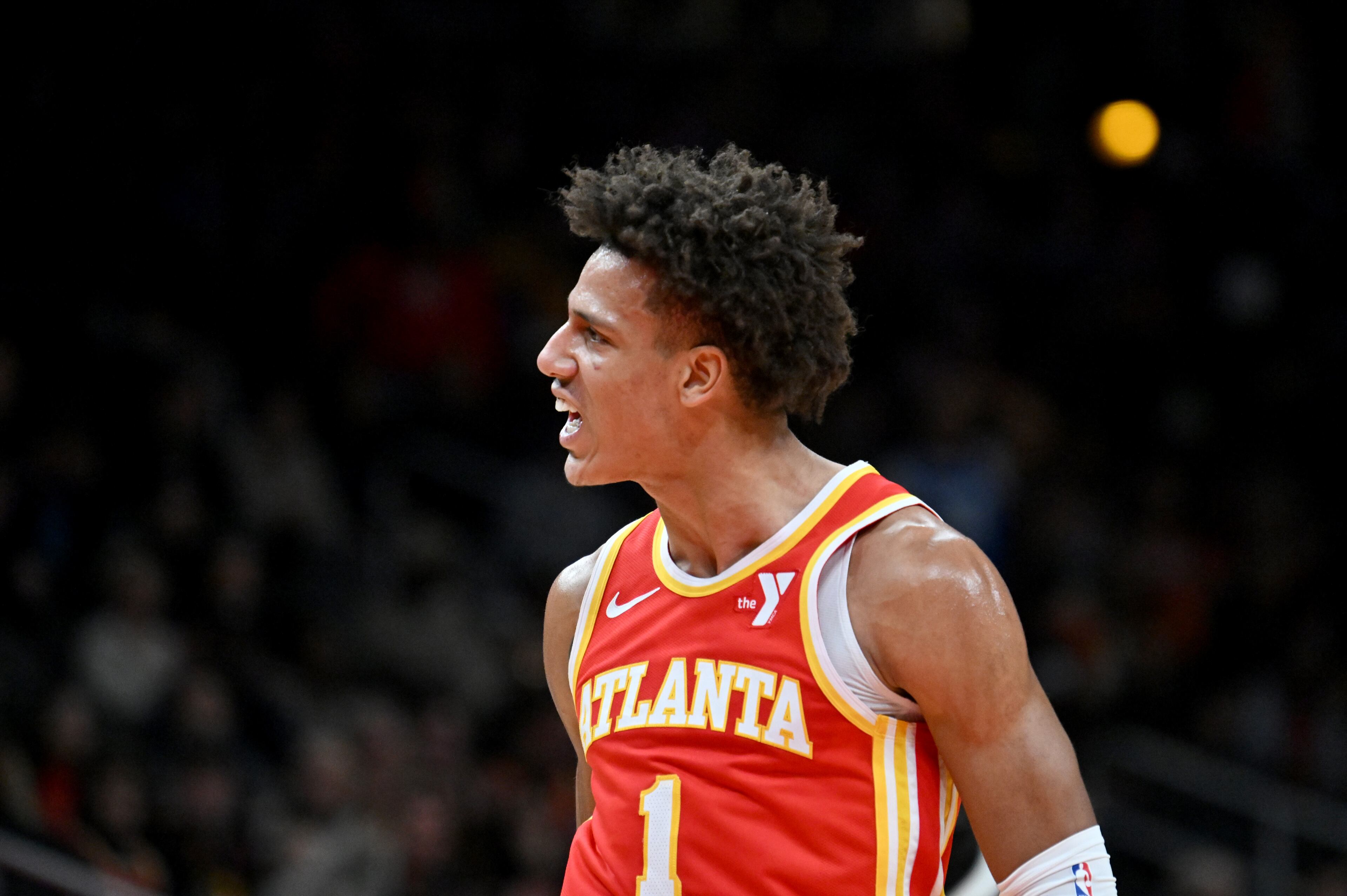 Atlanta Hawks forward Jalen Johnson (1) reacts after dunking the ball during the first half in an NBA basketball game at State Farm Arena, Wednesday, December 3, 2024, in Atlanta. (Hyosub Shin / Hyosub.Shin@ajc.com)