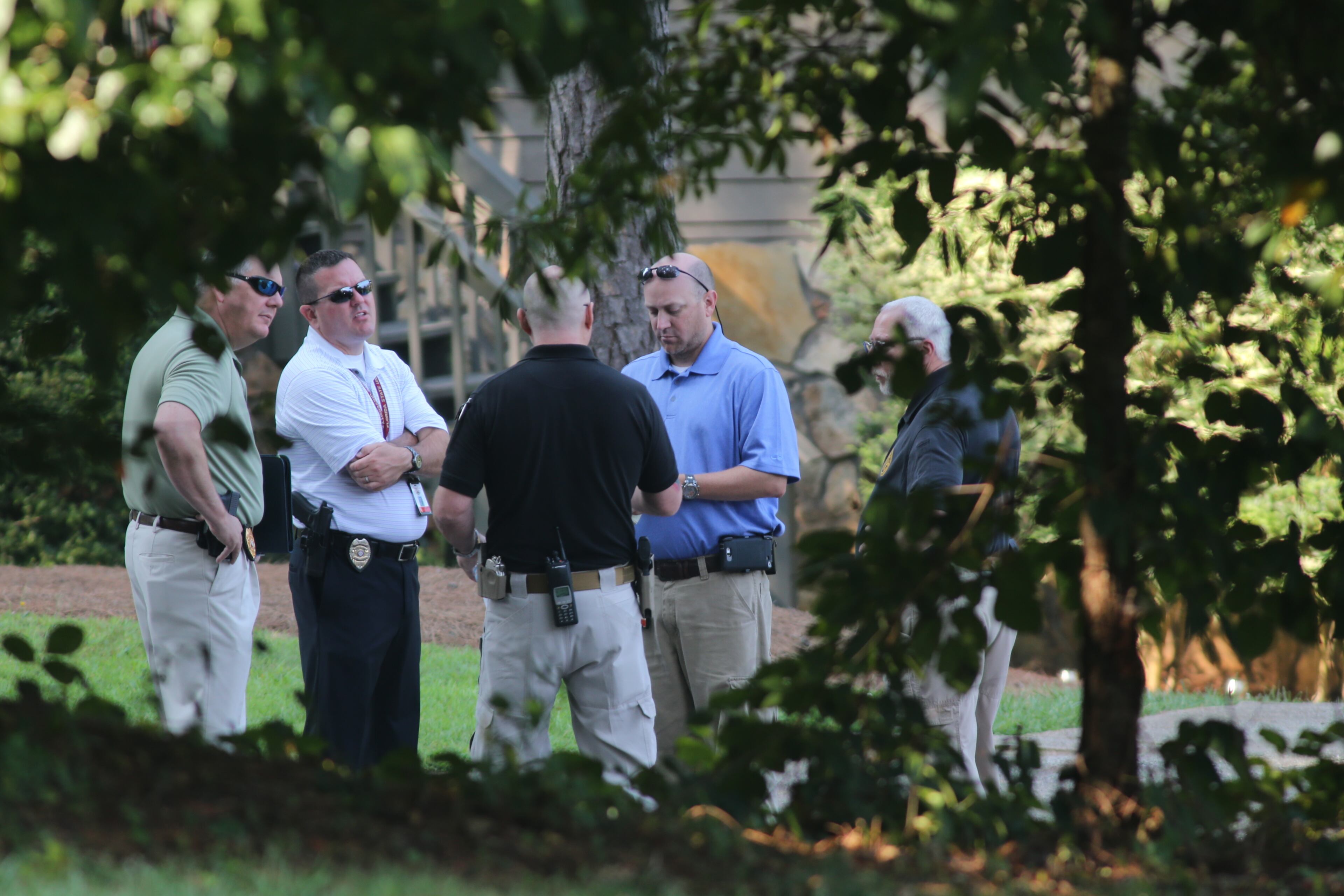 Duluth police are on the scene of a deadly home invasion in which a man was killed and a woman and child were shot and wounded. JOHN SPINK/JSPINK@AJC.COM