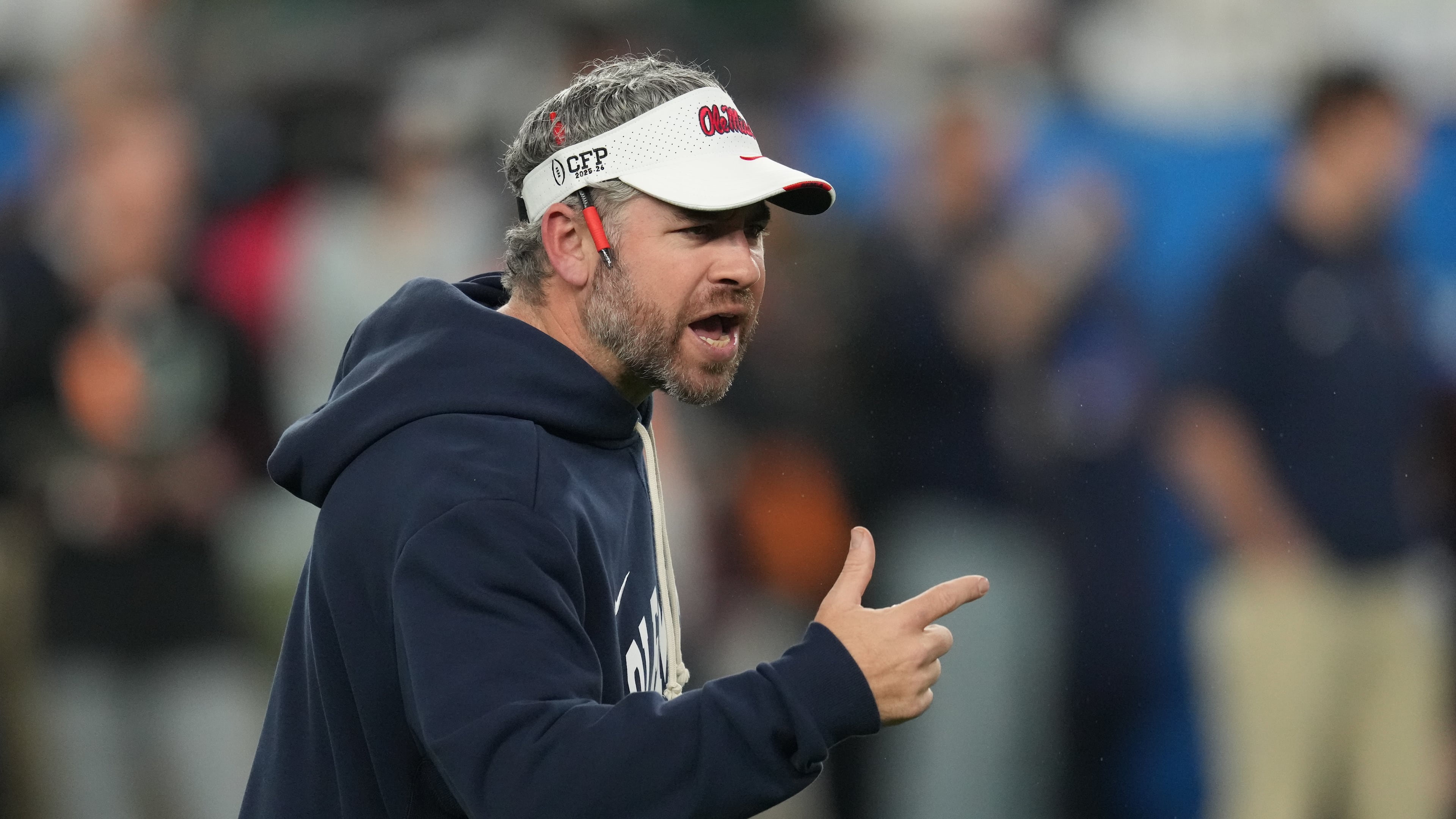 Mississippi head coach Pete Golding directs his players before the Fiesta Bowl NCAA college football playoff semifinal game against Miami, Thursday, Jan. 8, 2026, in Glendale, Ariz. (AP Photo/Ross D. Franklin)