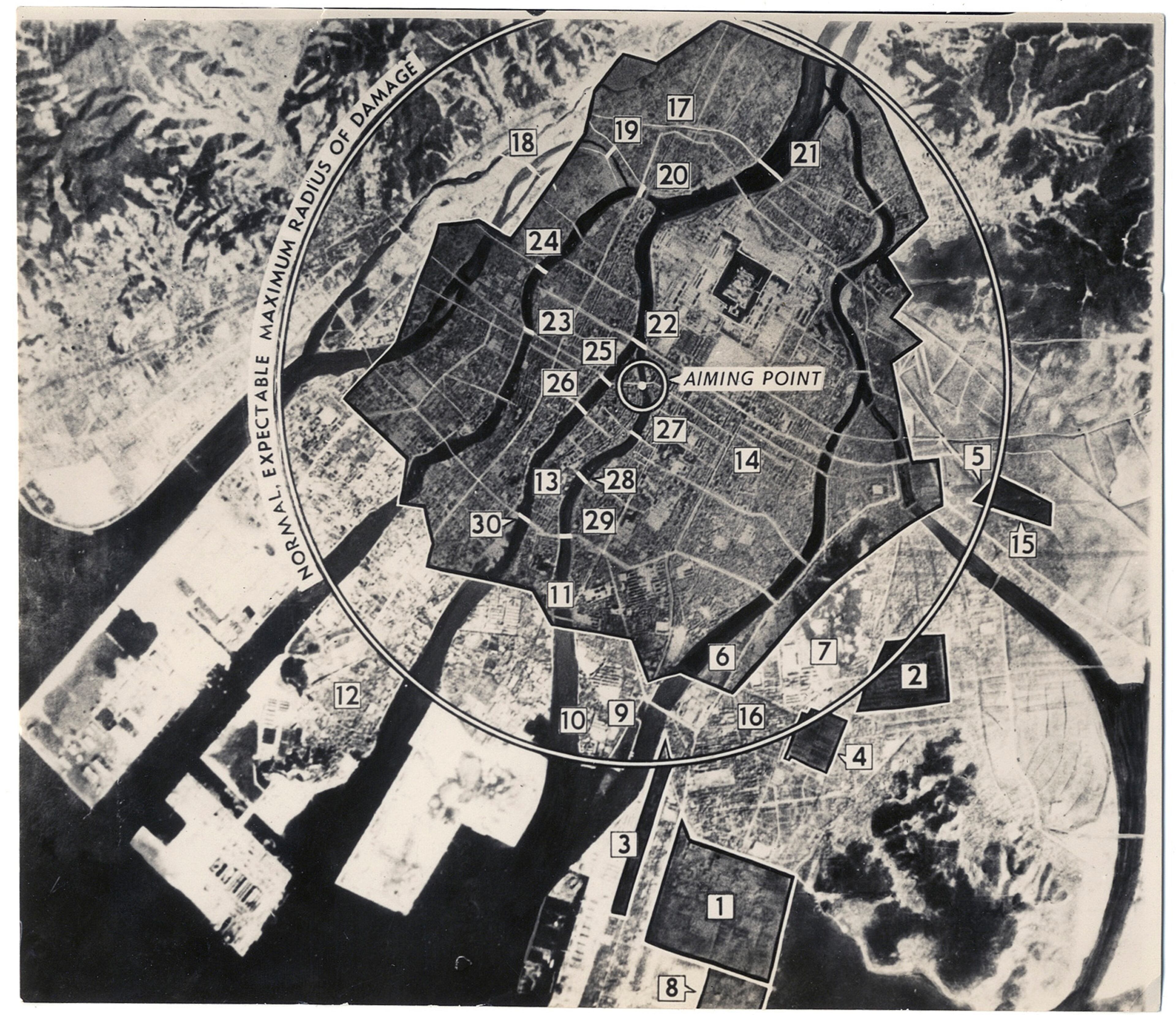 This reconnaissance photo from 1945 provided by the Museum of World War II Boston shows targeting information for the atomic bombing mission to Hiroshima. An original copy of the operations order for dropping an atomic bomb on Hiroshima is on display at the private museum in the Boston suburbs as the deadly attack marks its 70th anniversary. (Museum of World War II Boston via AP)