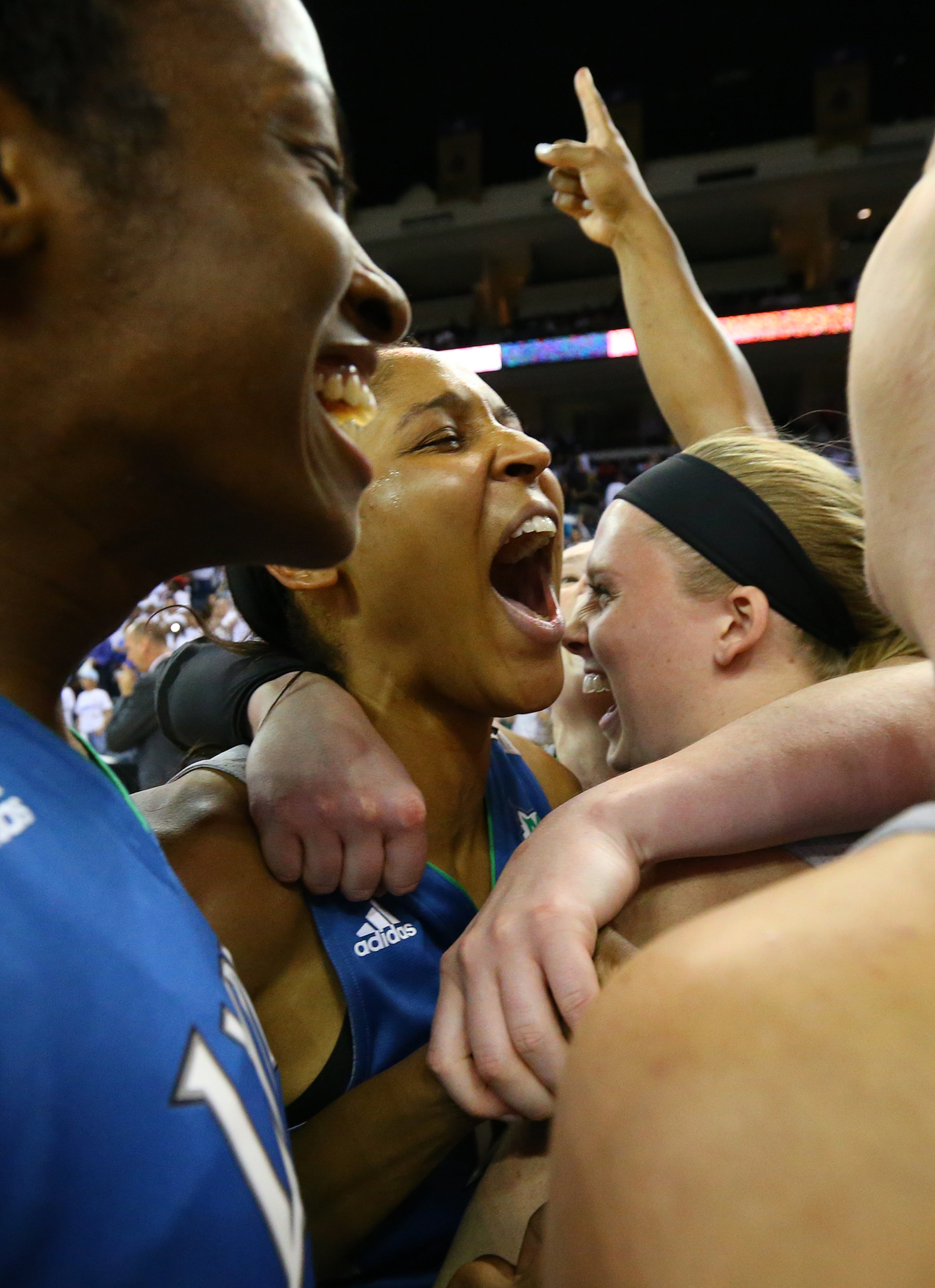 Maya Moore (center) and the Lynx celebrate defeating the Dream 86-77 to win the WNBA Championship on Thursday, Oct. 10, 2013, in Duluth.