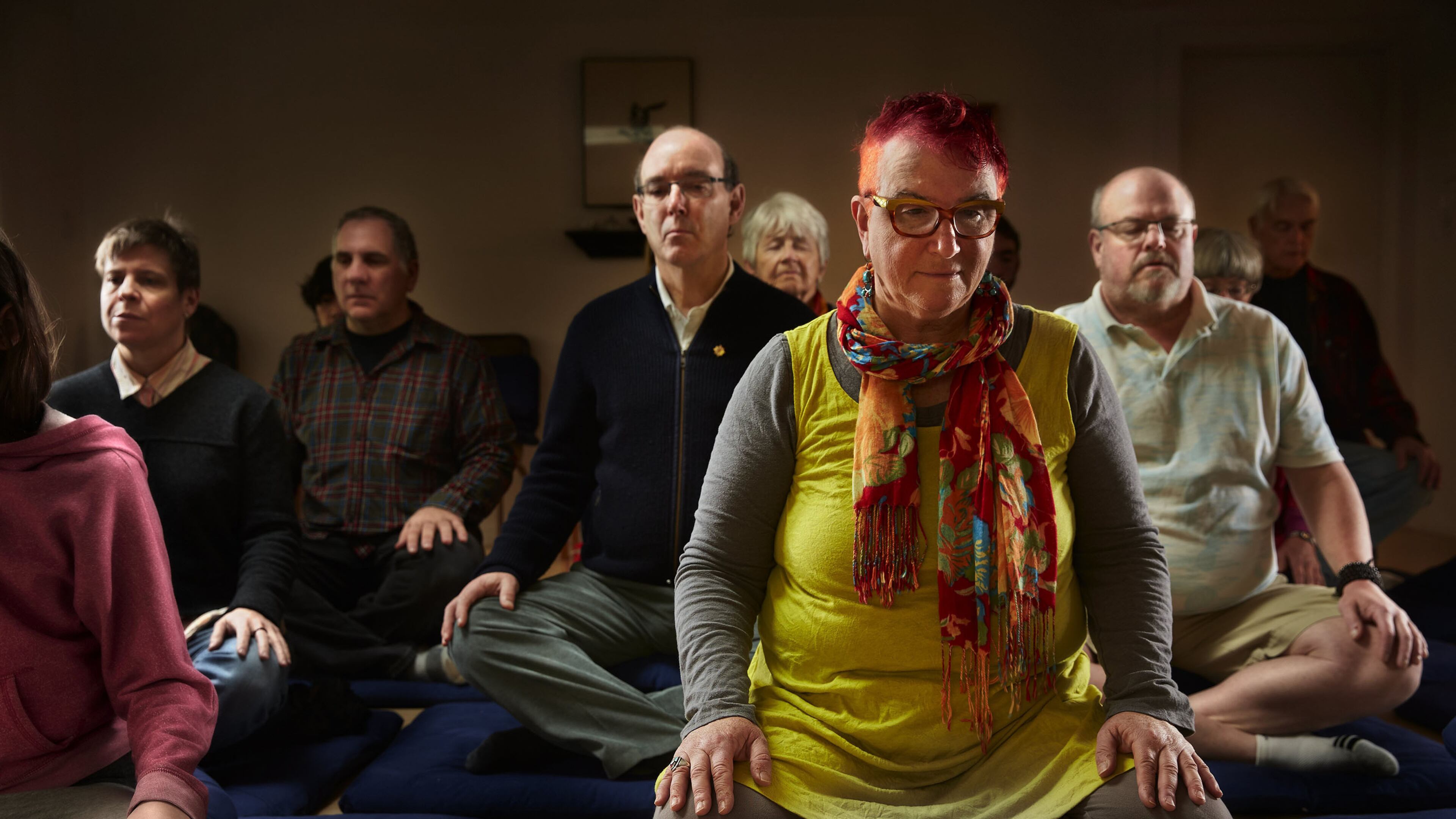 Sue Lesser, front right, joins others in a Sunday morning open meditation at the Shambhala Meditation Center in the Madison Valley neighborhood of Seattle. (Benjamin Benschneider/Seattle Times/TNS)