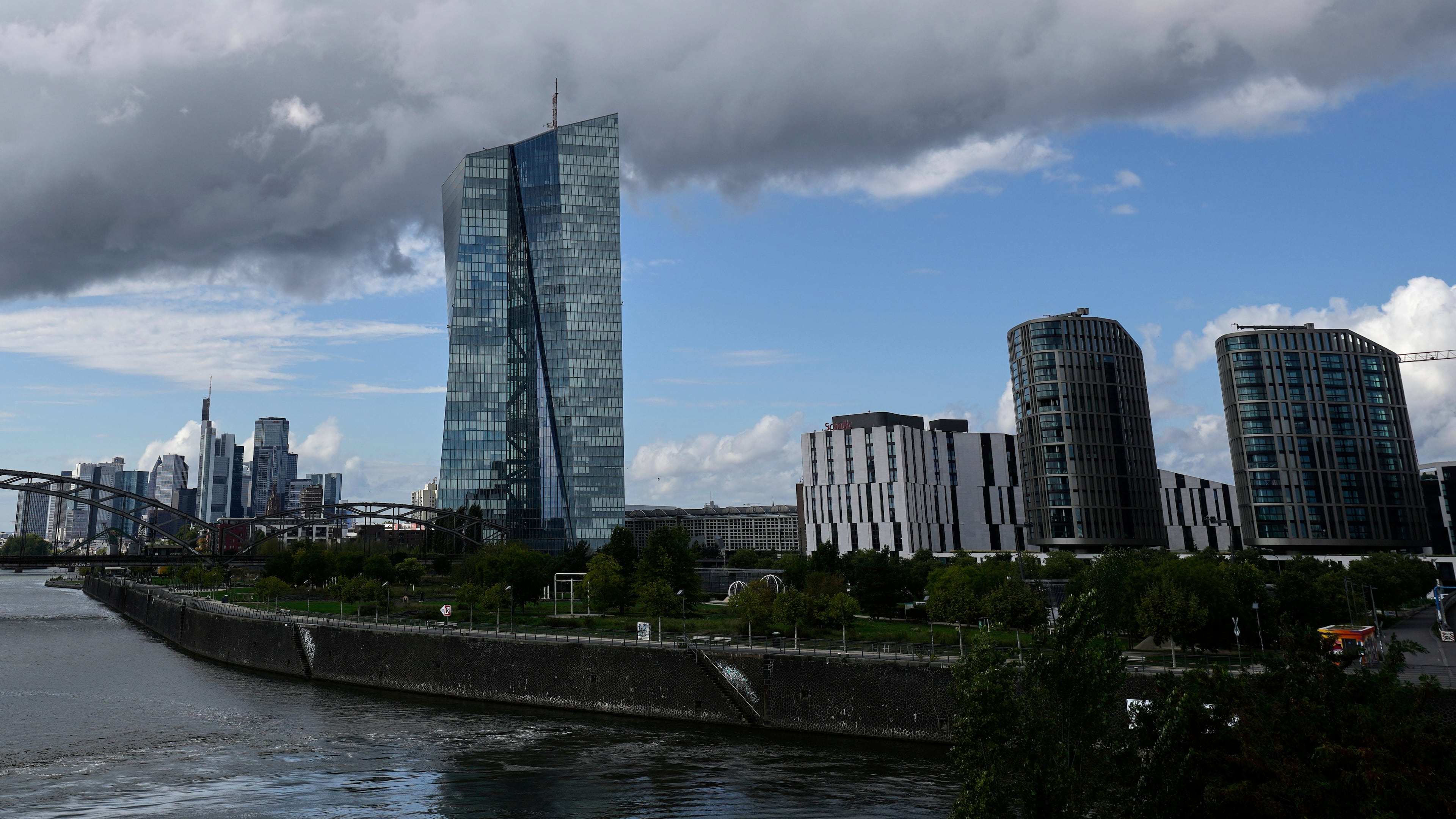 FILE - Clouds cover the sky over the headquarters of the European Central Bank in Frankfurt, Germany, Thursday, Sept. 11, 2025. (AP Photo/Michael Probst, File)
