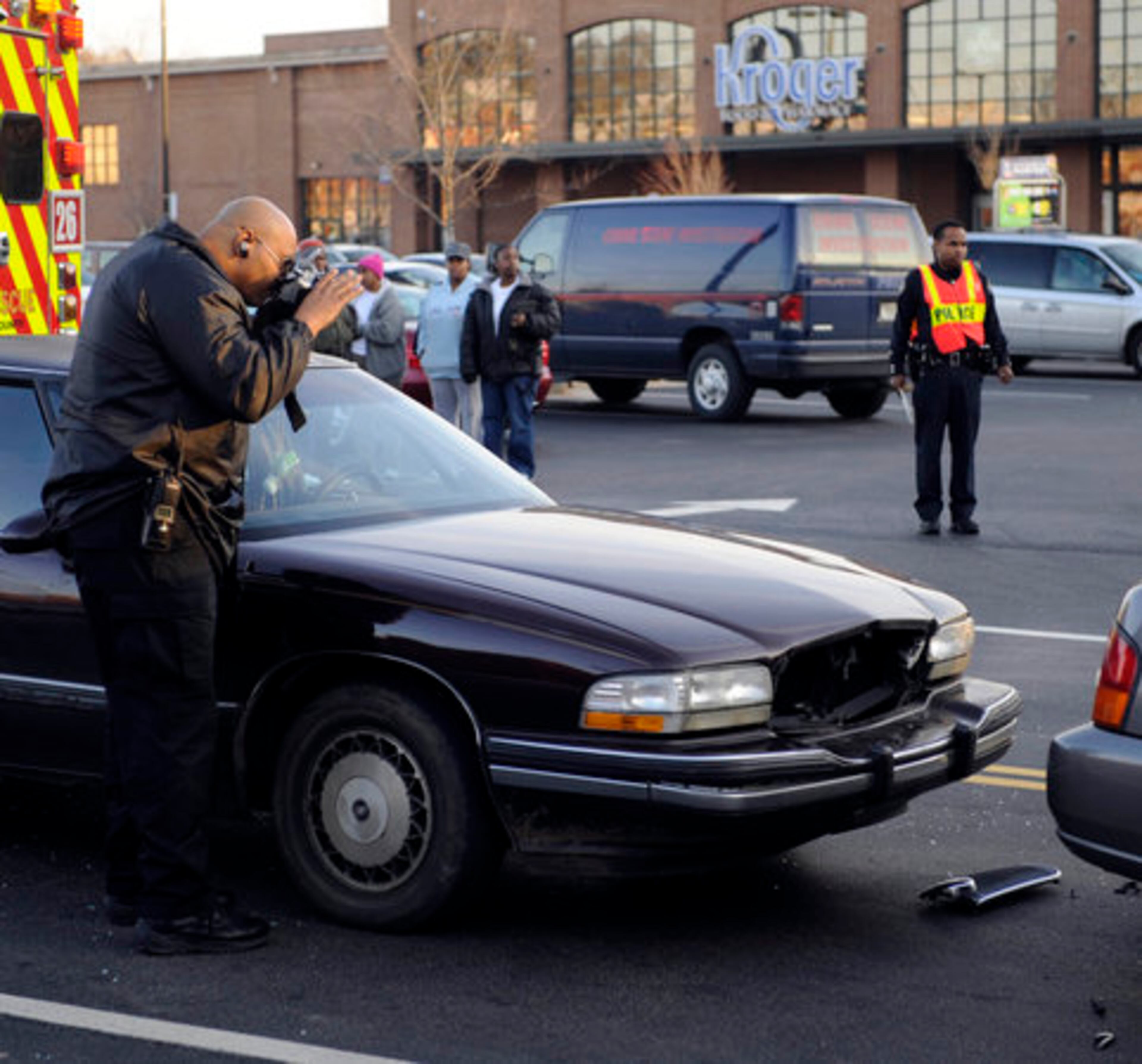 A photographer with CSI takes photos of the scene.