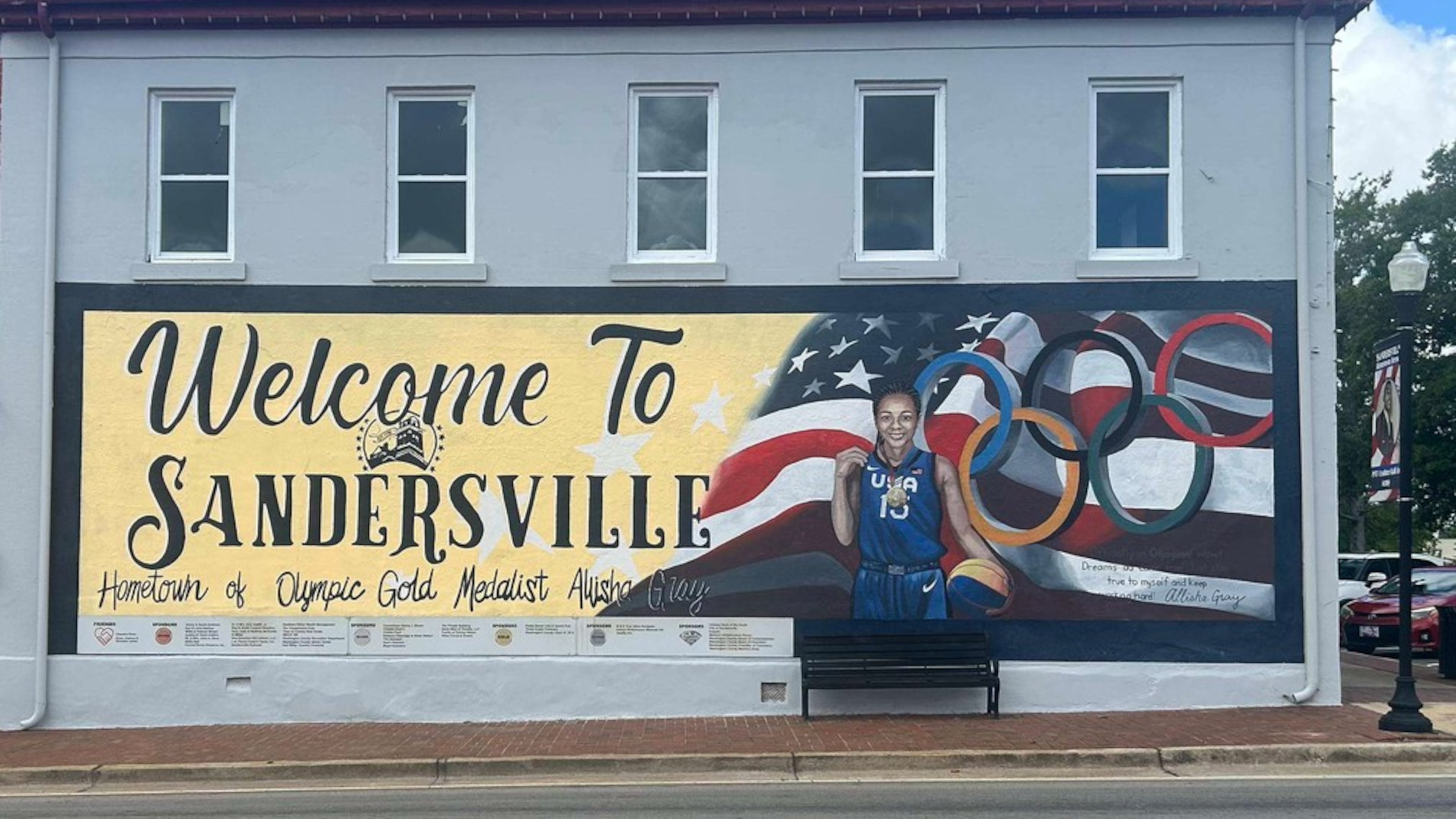Allisha Gray is featured on a mural in Sandersville, Georgia, that celebrates her Olympic gold medal. (Lauren Williams/AJC)