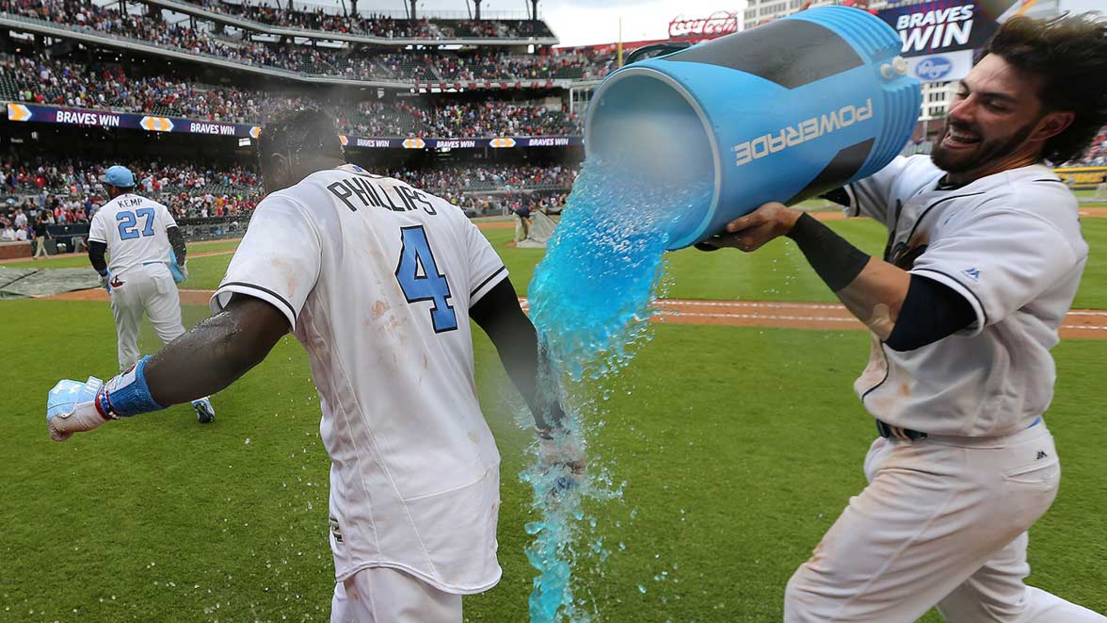 Dansby Swanson dunks Brandon Phillips after he hit a walk off RBI single to beat the Miami Marlins 5-4 Sunday at SunTrust Park.