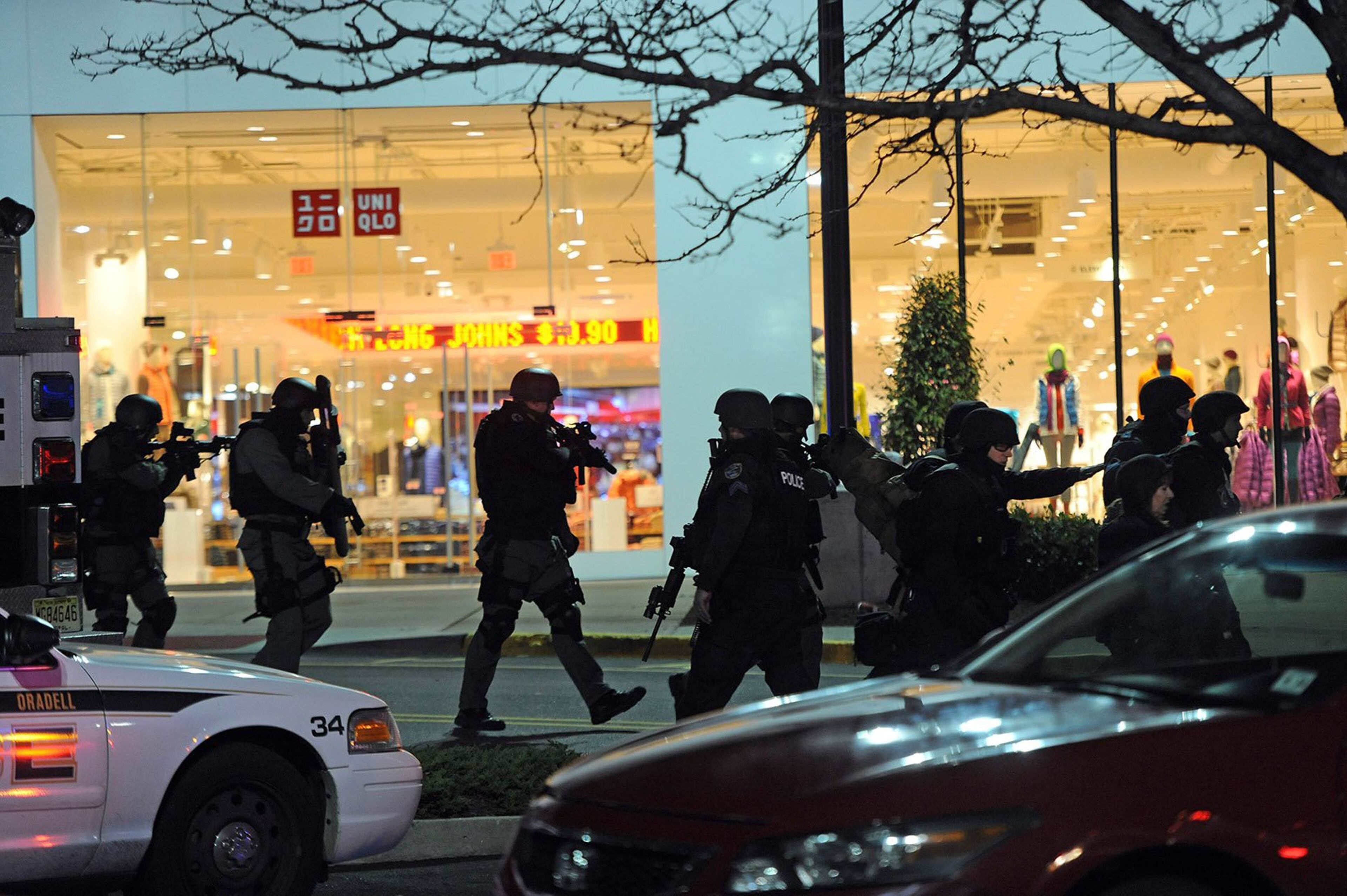 Police and SWAT teams descend on the scene of a shooting at Westfield Garden State Plaza mall in Paramus, New Jersey, on Monday, November 4, 2013. (Tyson Trish/The Record/MCT)