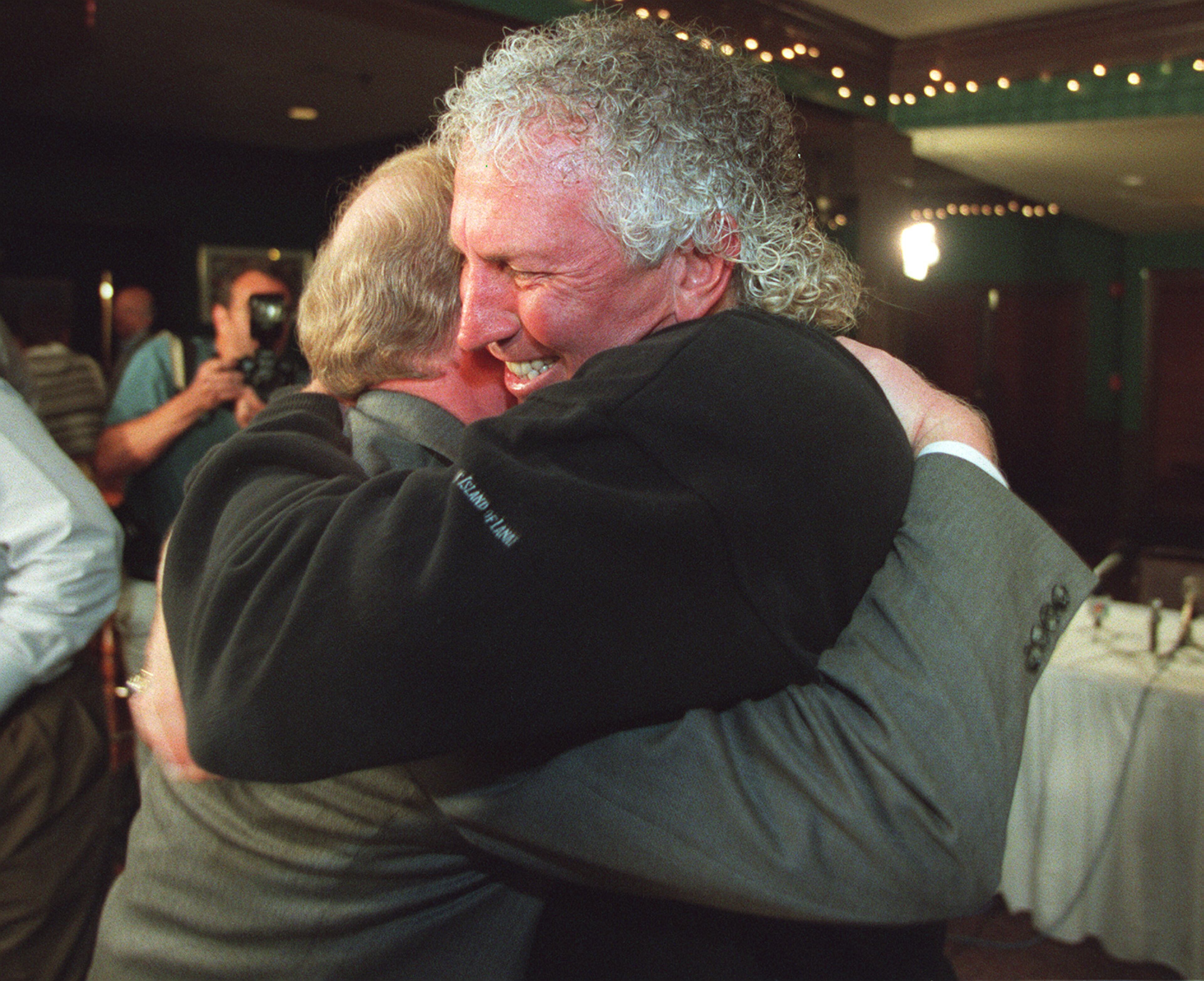 1998: Braves announcer Don Sutton hugs Rick Shaw, former Braves radio producer, a press conference on January 5, 1998 where Sutton talked about his entry into the Hall of Fame. (AJC Staff Photo/Rich Addicks)