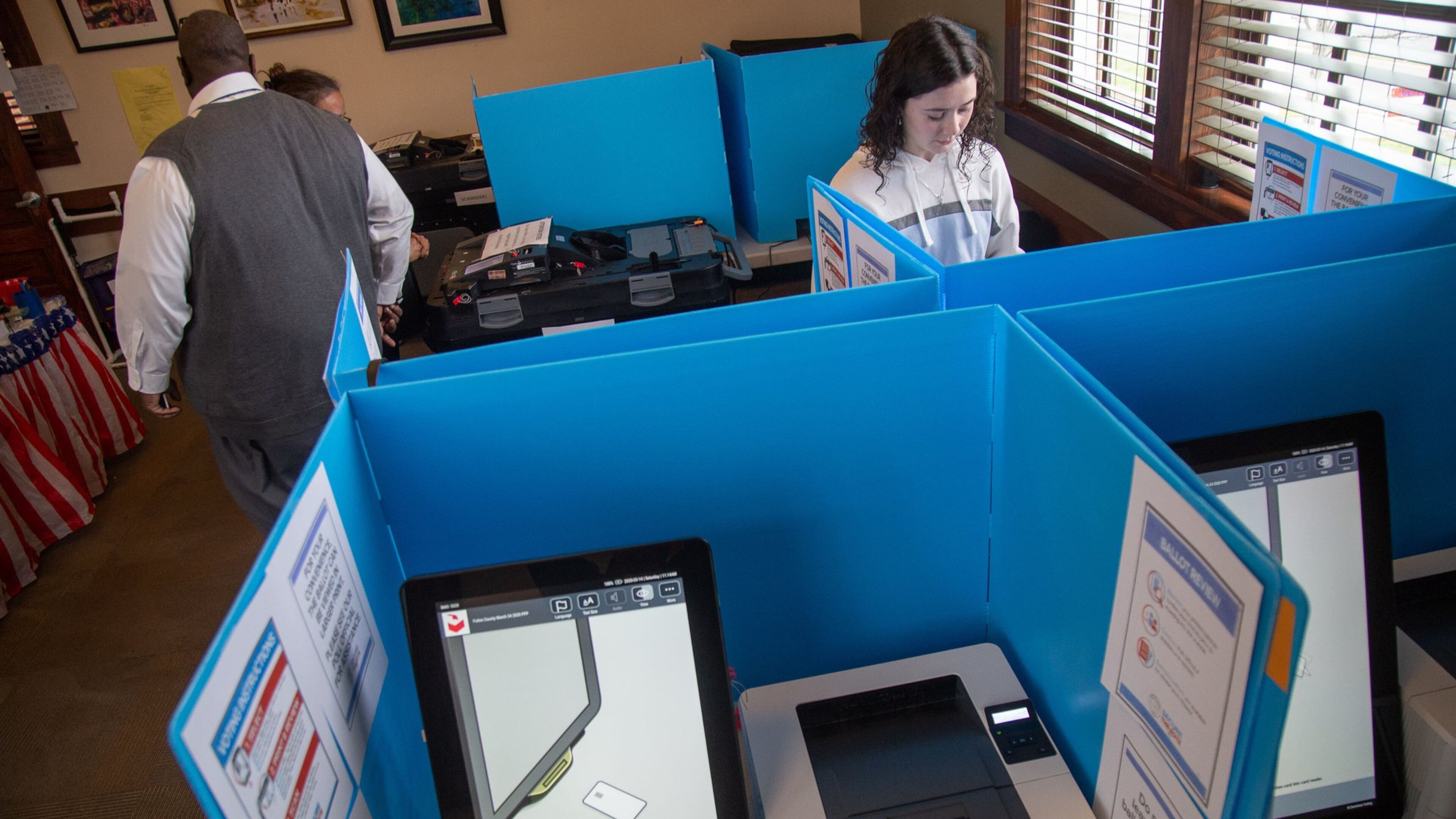 Morgan Jones cast a vote for the first time during a presidential election during Saturday’s early voting at Johns Creek. STEVE SCHAEFER / SPECIAL TO THE AJC