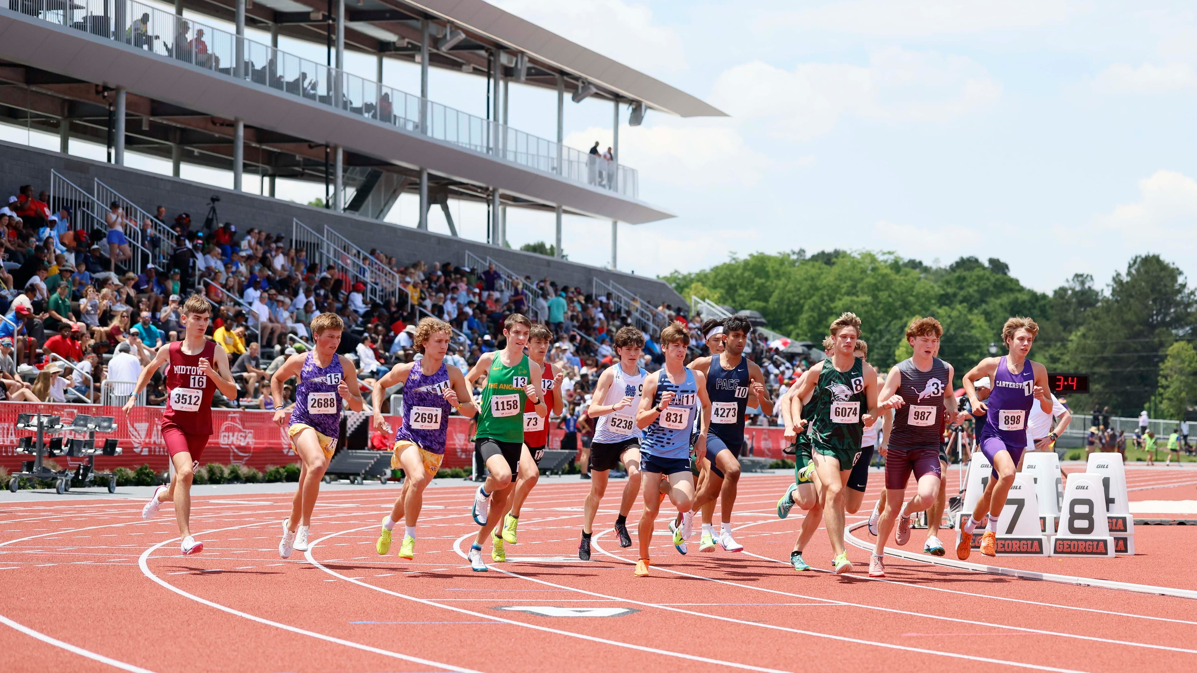 Runners compete in the Boys 1600-meter Run AAAA at the GHSA track and field state championships at UGA Spec Towns Track on Monday, May 11, 2026, in Athens.
(Miguel Martinez/AJC)
