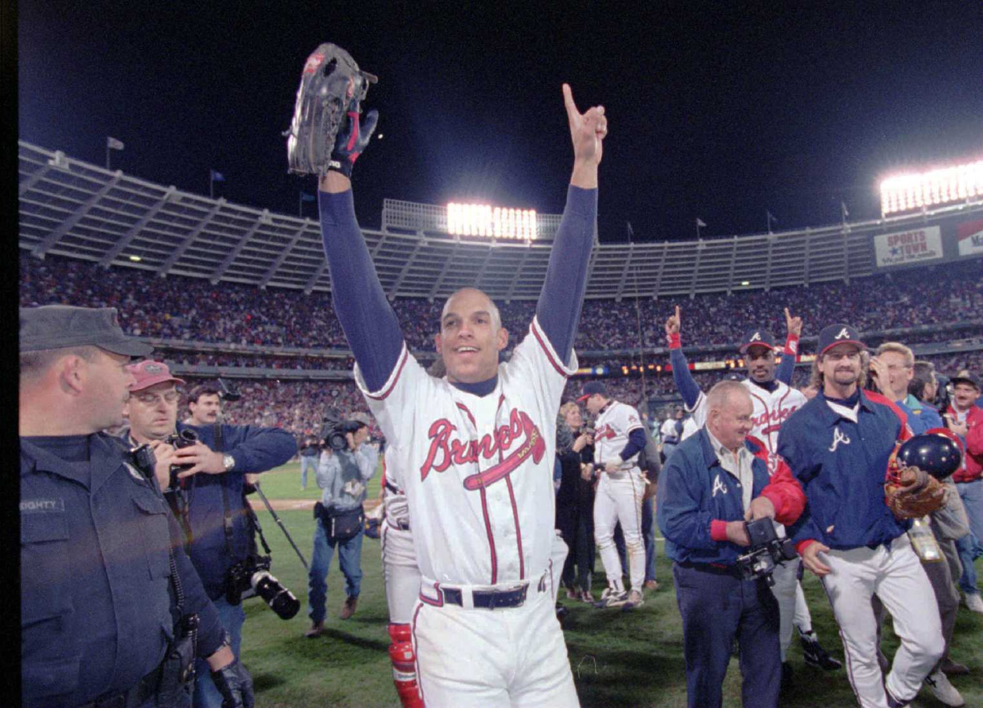 Braves outfielder David Justice waves to the crowd after the Braves defeated the Cleveland Indians in Game Six of the World Series in Atlanta.
