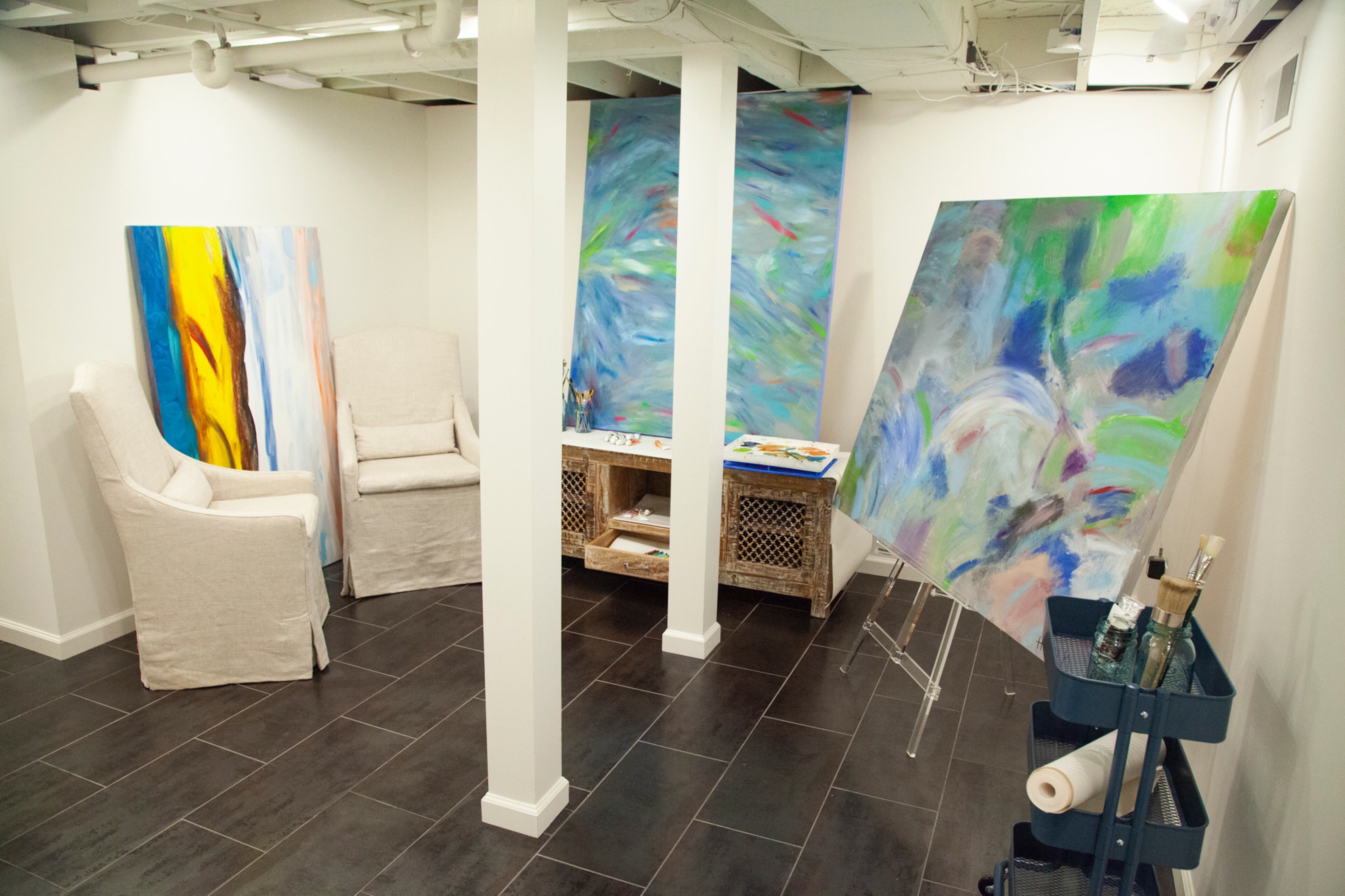 The finished basement includes an art studio for the homeowners' daughter, Helen Kolker. "She's got a God-given talent for what looks good on a canvas," said her mother, Jan Kolker.