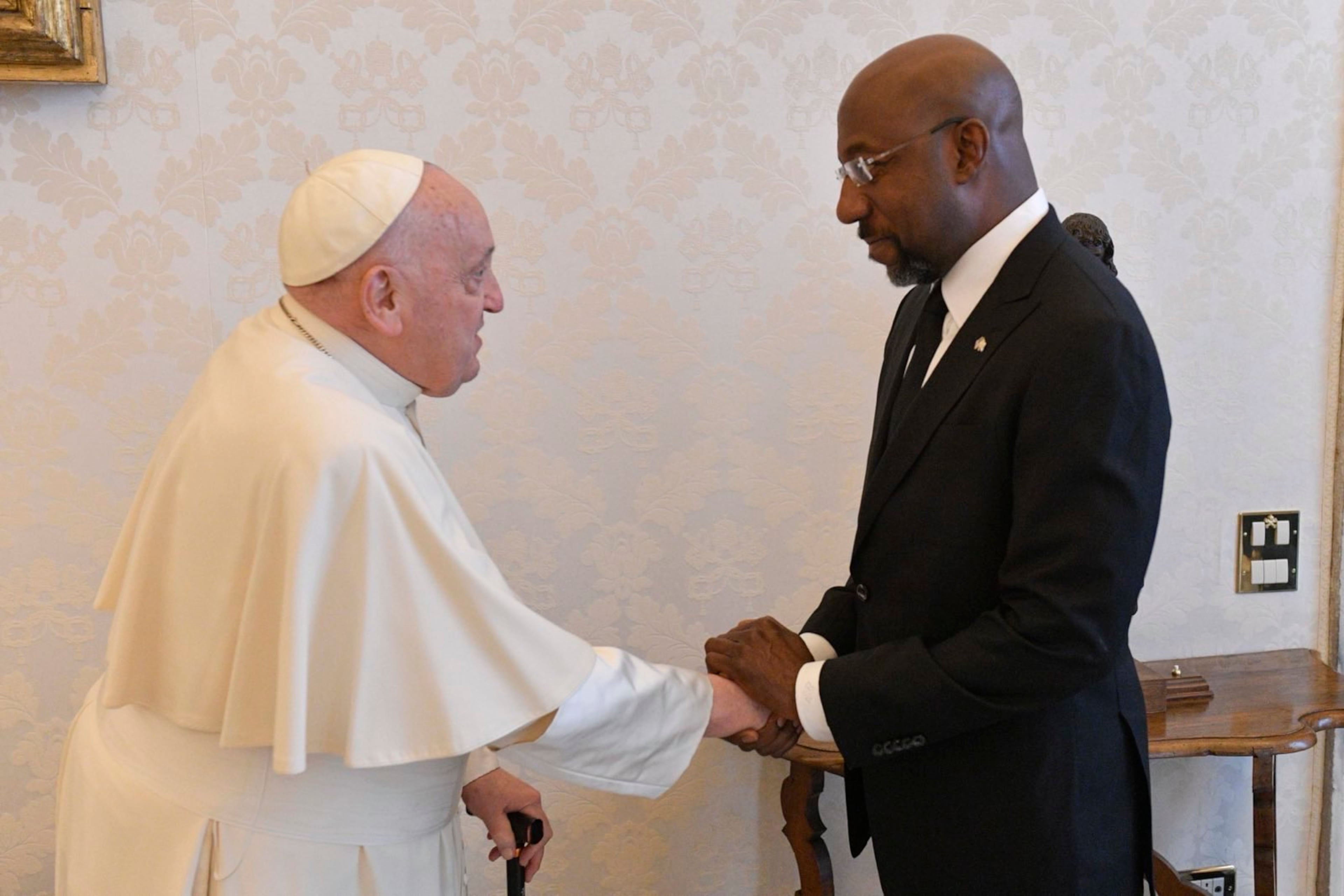 U.S. Sen. Raphael Warnock, an Atlanta Democrat, greeted Pope Francis at the Vatican on April 20, 2024.