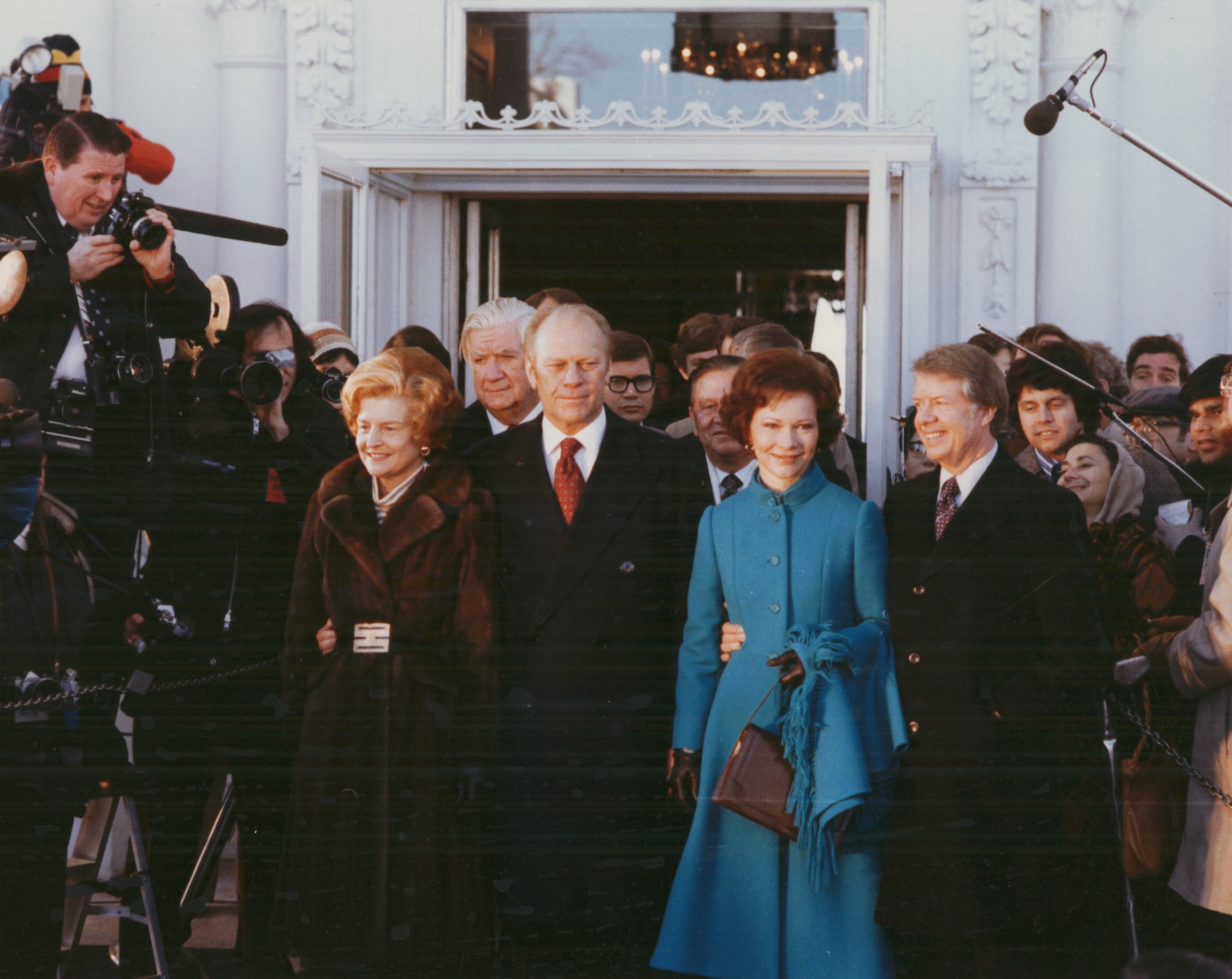 Outgoing President Gerald Ford and his wife Betty are seen in this 1977 file photo with newly inaugurated President Jimmy Carter and his wife Rosalynn. Once political rivals from different parties, the two men and their wives went on to form a close friendship over nearly three decades.