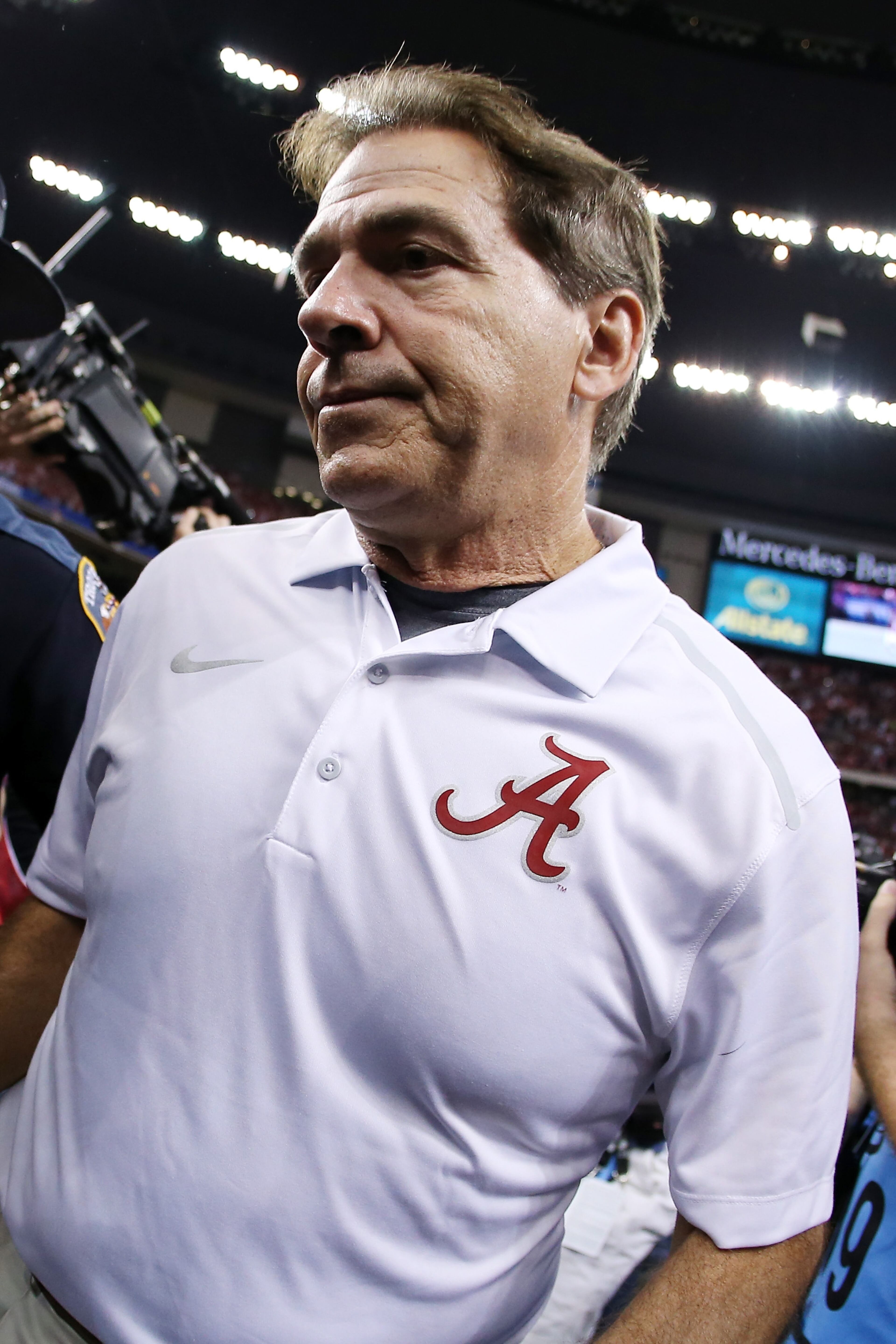 Head coach Nick Saban of the Alabama Crimson Tide walks off the field after losing to the Ohio State Buckeyes during the All State Sugar Bowl at the Mercedes-Benz Superdome on January 1, 2015 in New Orleans, Louisiana. (Photo by Chris Graythen/Getty Images)