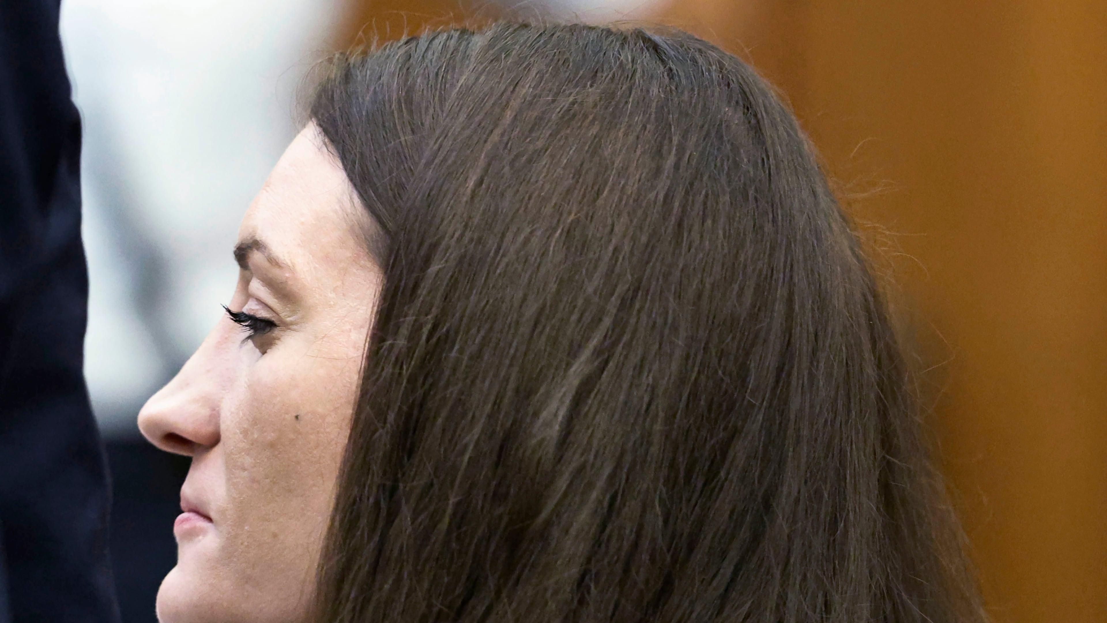 Lindsay Clancy grins after her attorney Kevin Reddington concluded his cross examination of rebuttal witness Dr. Avram Mack during her murder trial at Plymouth Superior Court, Monday, Aug. 24, 2026 in Plymouth, Mass. (Greg Derr/The Patriot Ledger via AP, Pool)