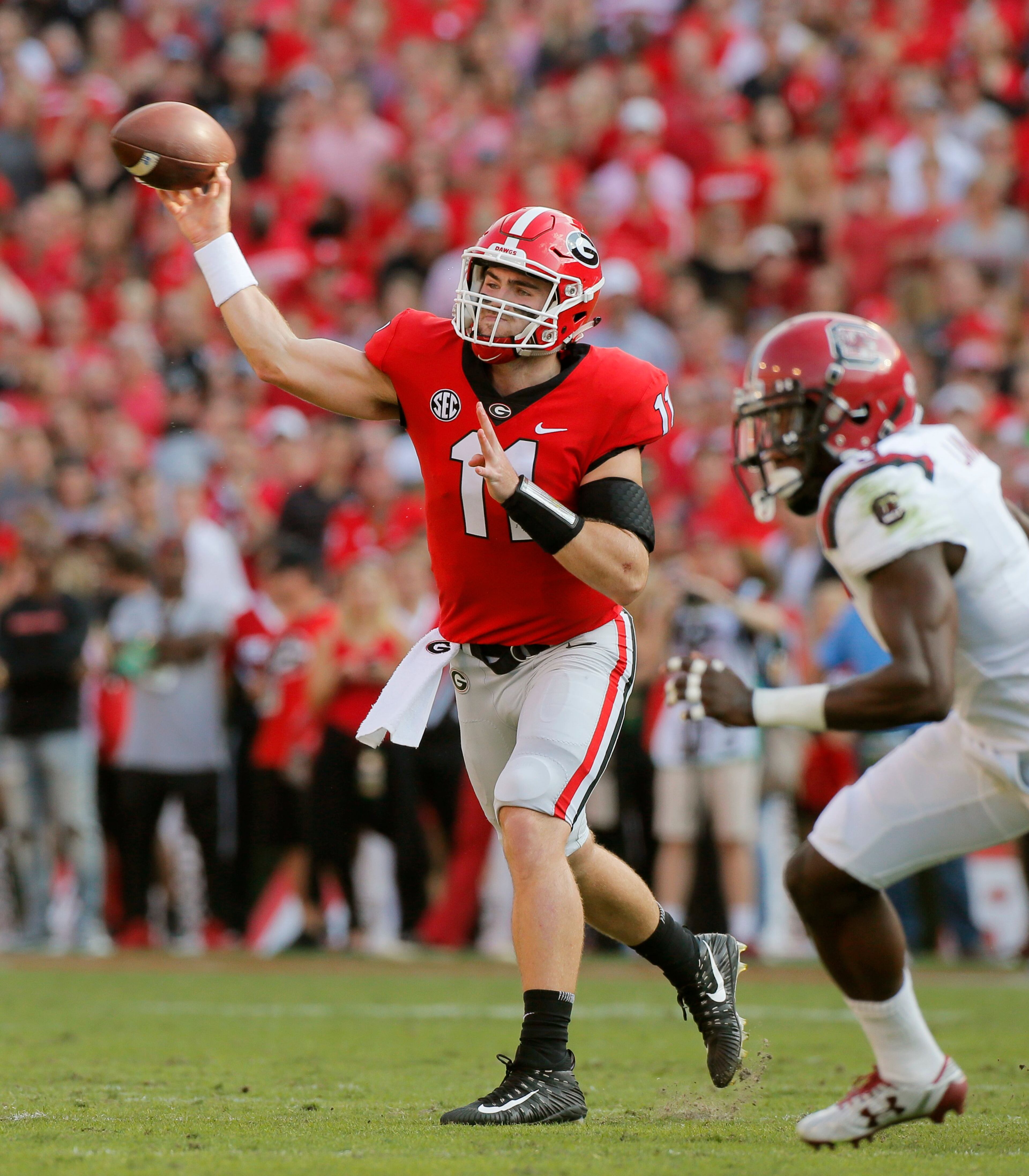 11/4/17 - Athens - Georgia Bulldogs quarterback Jake Fromm (11) passes during the first half.. NCAA football game between the University of Georgia Bulldogs and the University of South Carolina Gamecocks BOB ANDRES /BANDRES@AJC.COM