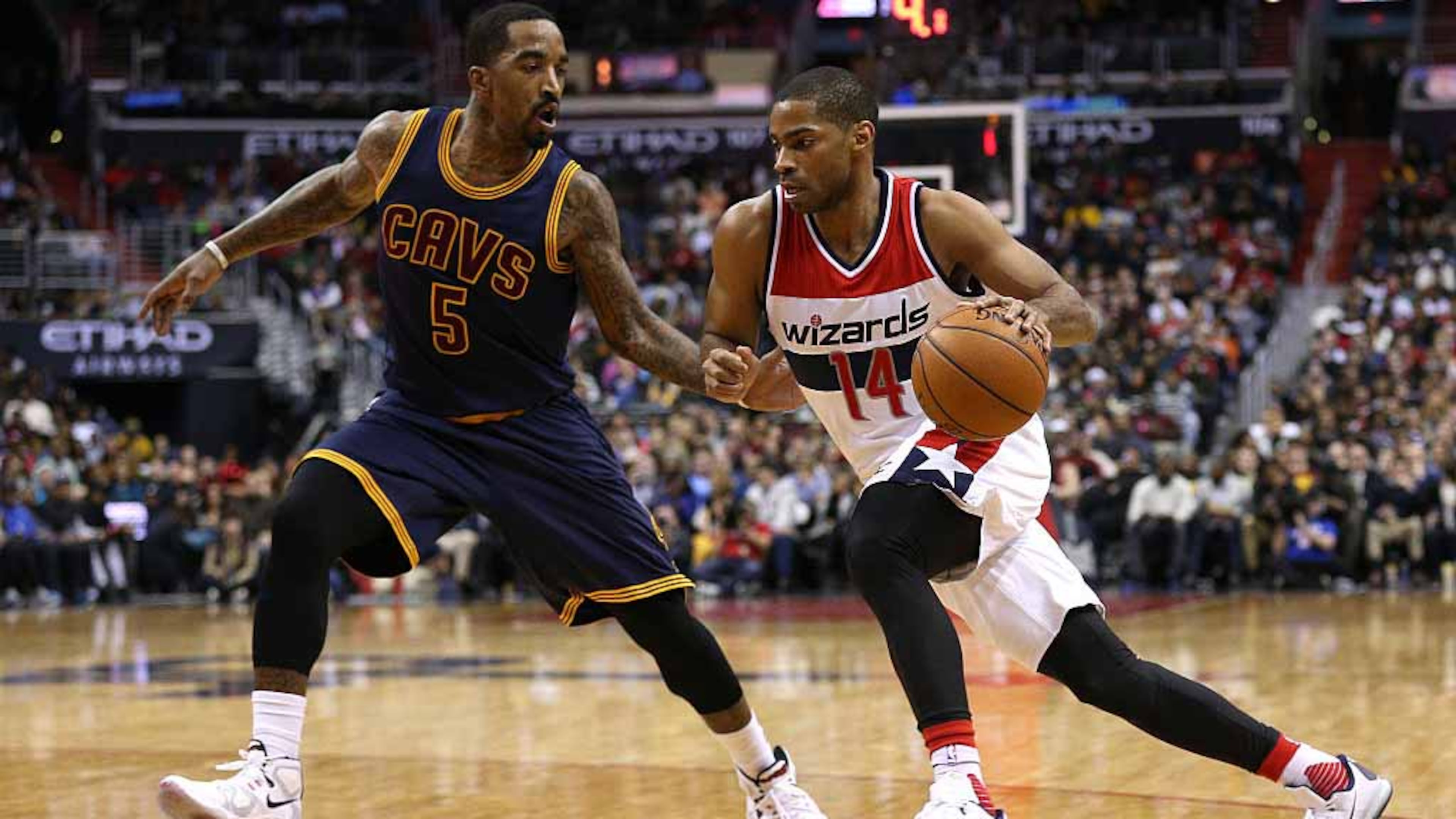 Gary Neal of the Washington Wizards dribbles in front of J.R. Smith of the Cleveland Cavaliers during the second half at Verizon Center on January 6, 2016 in Washington, DC. (Photo by Patrick Smith/Getty Images)