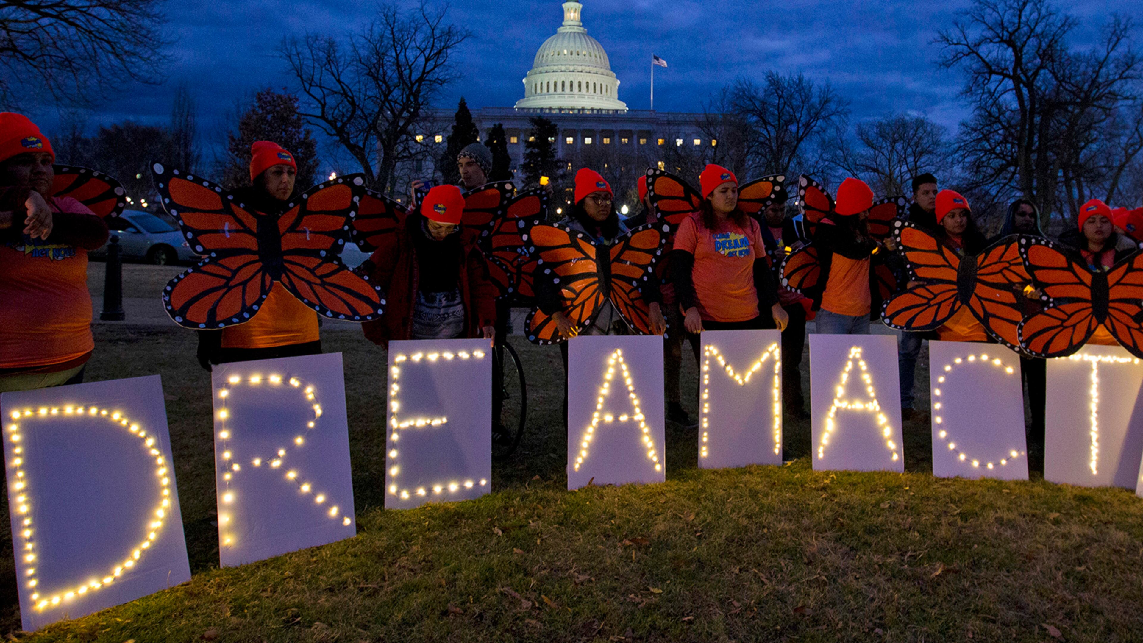 Demonstrators rally in support of Deferred Action for Childhood Arrivals (DACA) outside the Capitol, Sunday, Jan. 21, 2018, in Washington, on the second day of the federal shutdown. Democrats have been seeking a deal to protect the "Dreamers," who have been shielded against deportation by DACA, which President Donald Trump halted last year. (AP Photo/Jose Luis Magana)