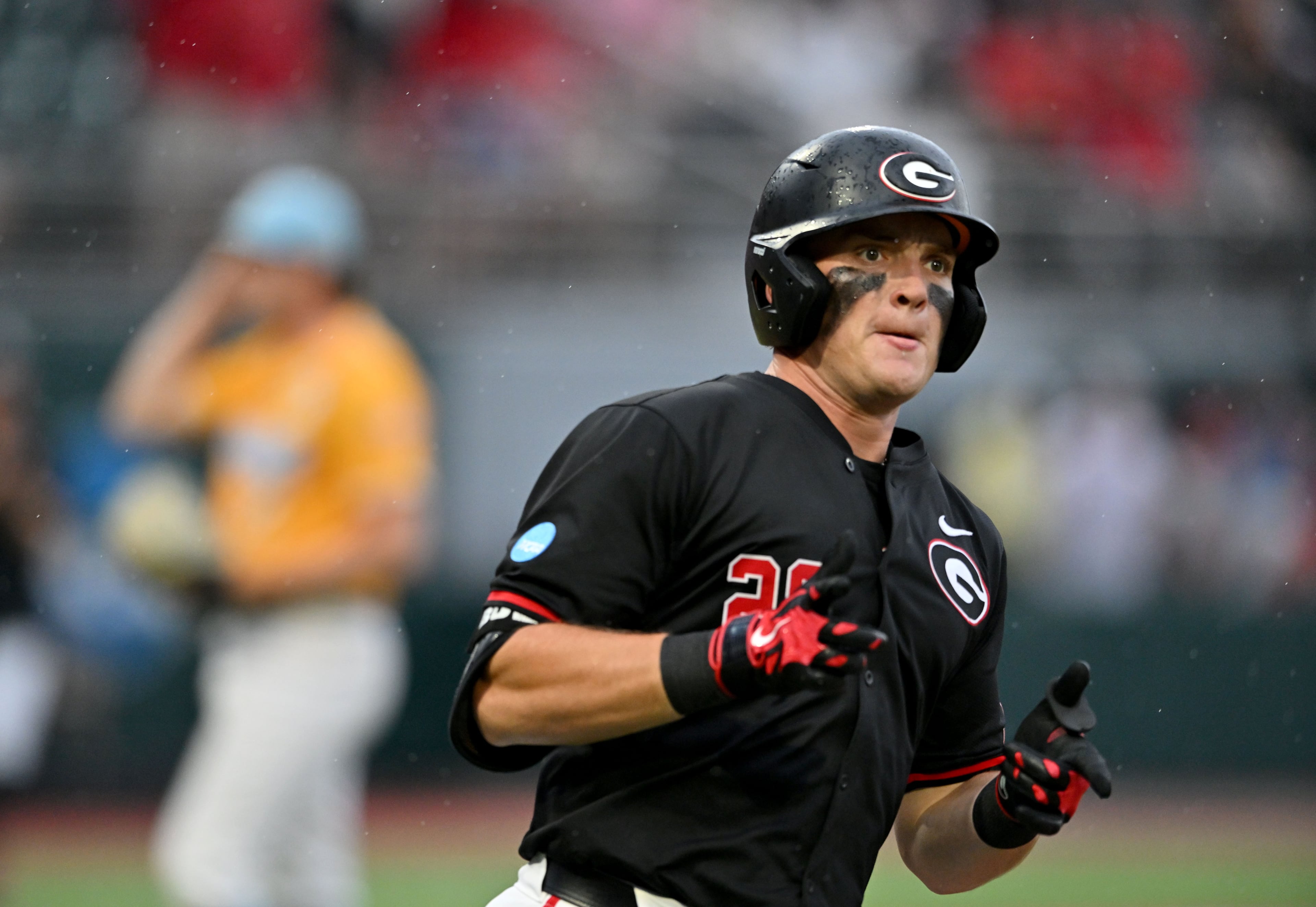 Georgia catcher Brennan Hudson (28) reacts as he circles the bases on a solo home run during the fifth inning of their NCAA Regional game at Foley Field, Friday, May 29, 2026, in Athens. (Hyosub Shin/AJC)