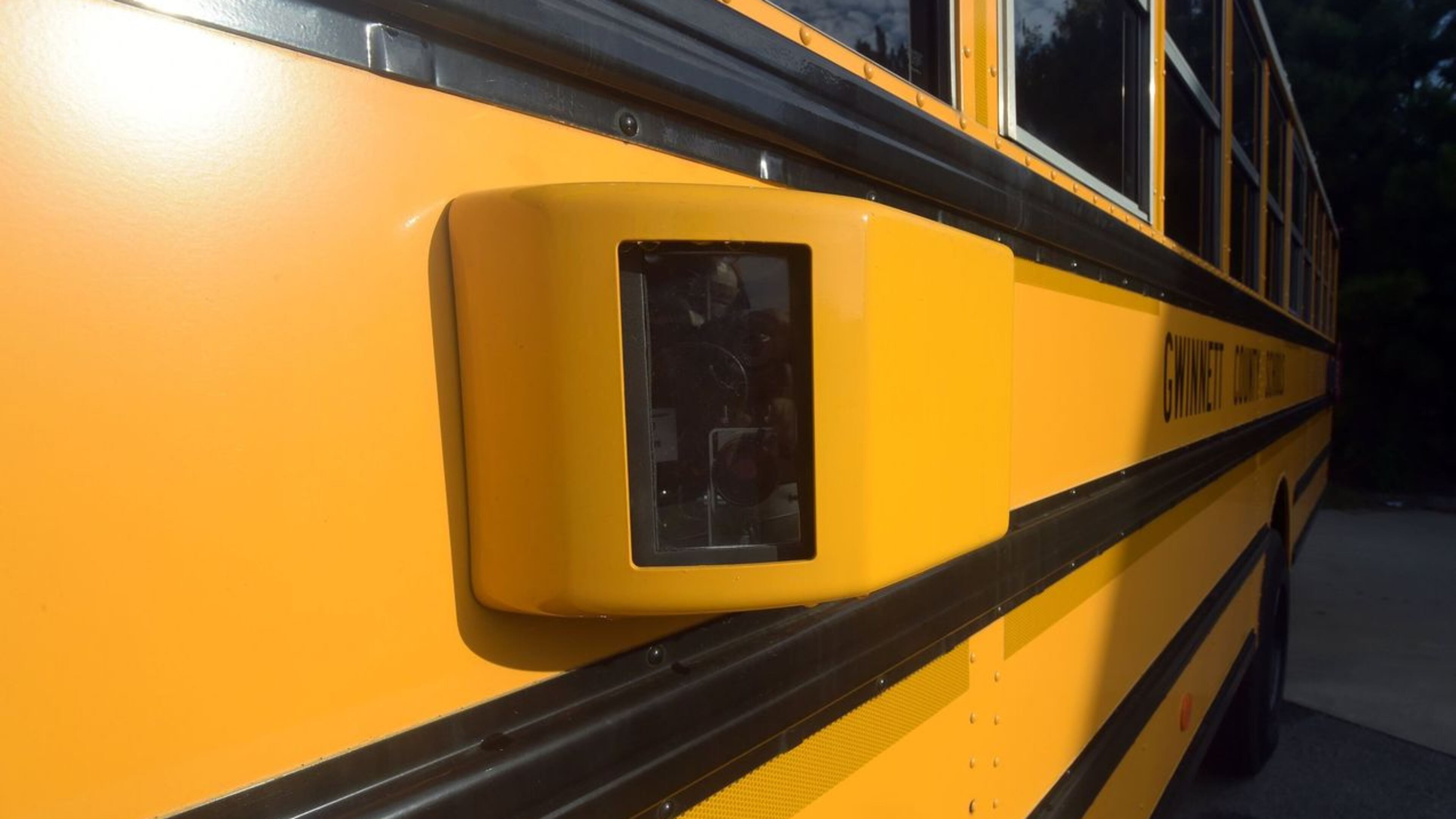 Gwinnett County is using cameras like this to catch motorists who pass school buses when they stop to pick up or drop off students. KENT JOHNSON / AJC.COM
