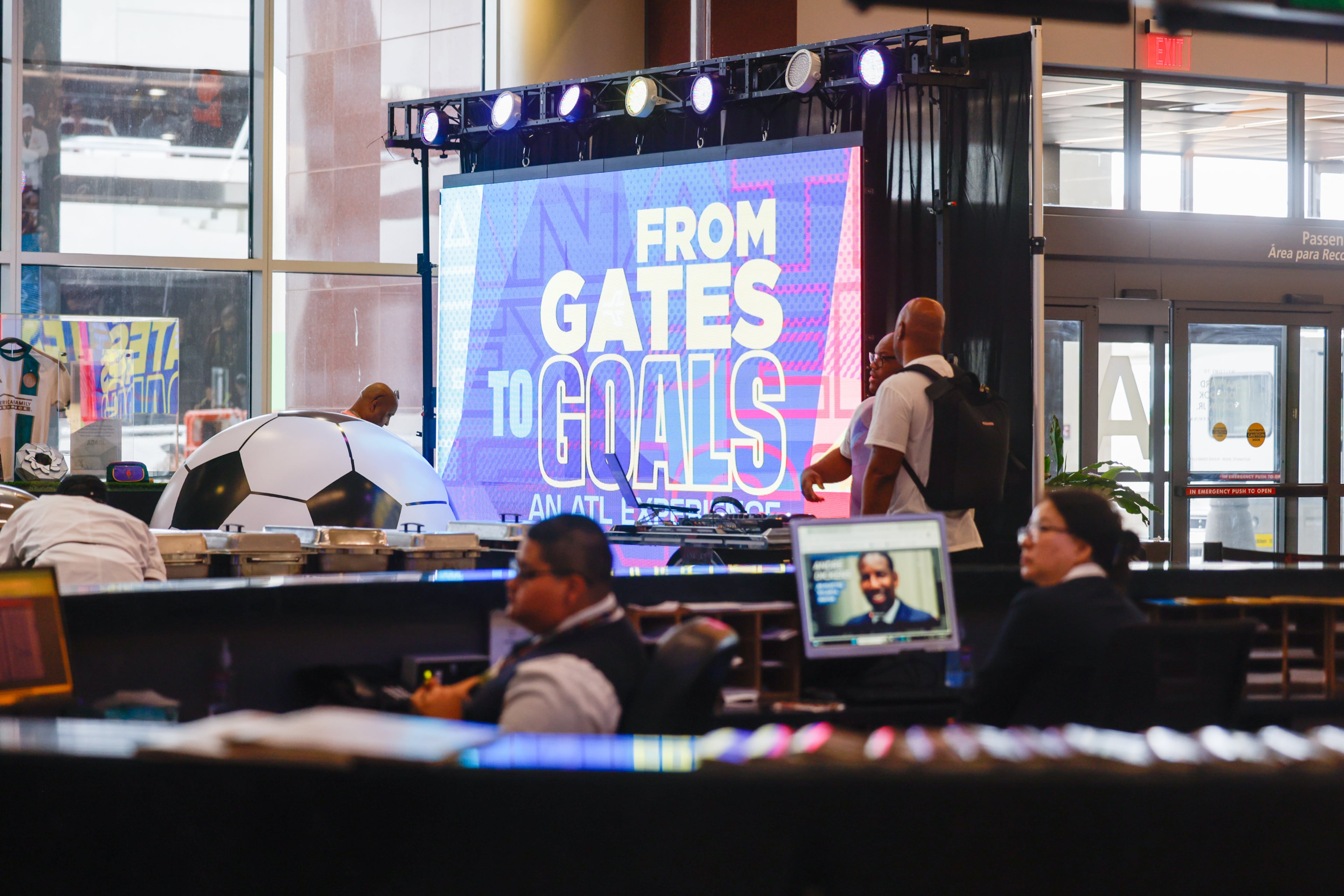 A screen marks the "From Gates to Goals" exhibit celebrating the upcoming FIFA World Cup at Hartsfield-Jackson Atlanta International Airport's international terminal in Atlanta on May 27, 2026. (Arvin Temkar/AJC)