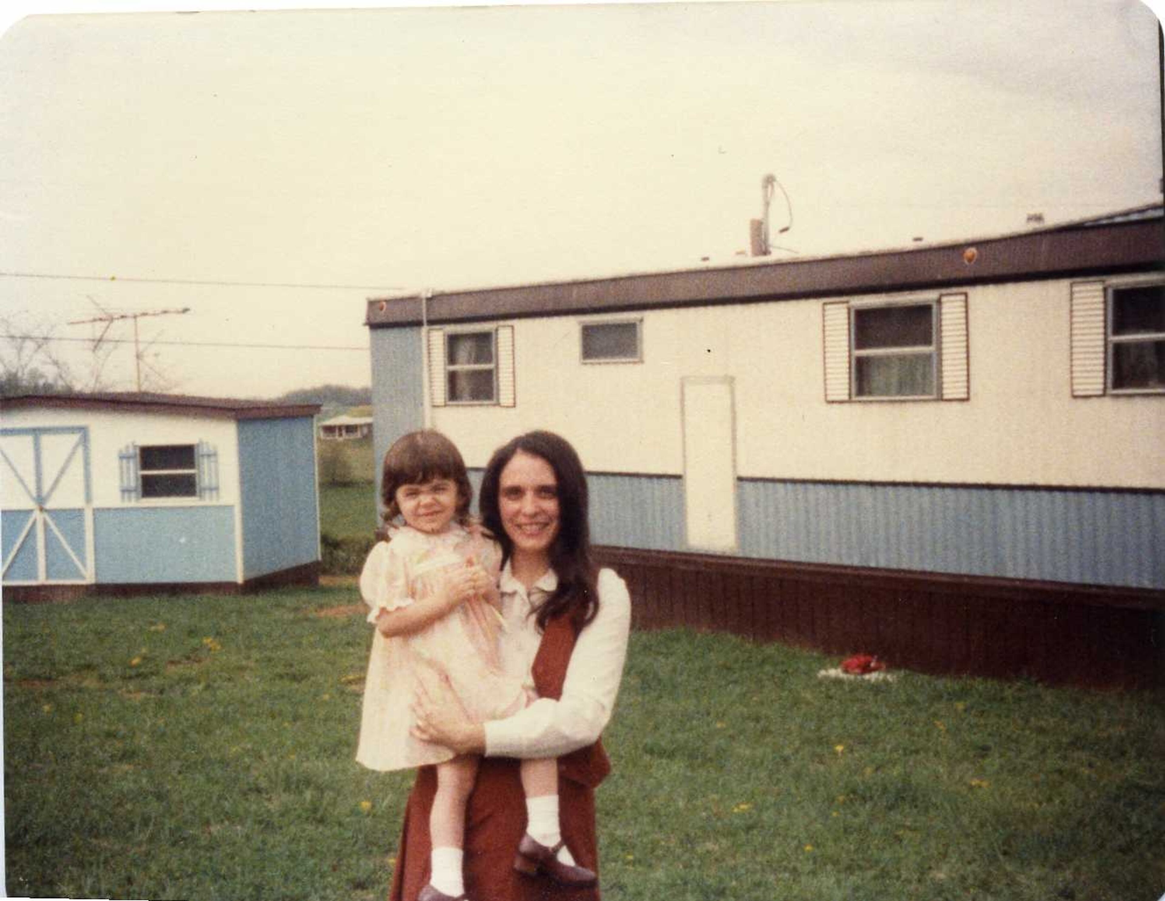 Three-year-old Christal and her mother, Judy Presley, in happier times outside their trailer in Honaker, Va., a town of fewer than 1,500 residents.