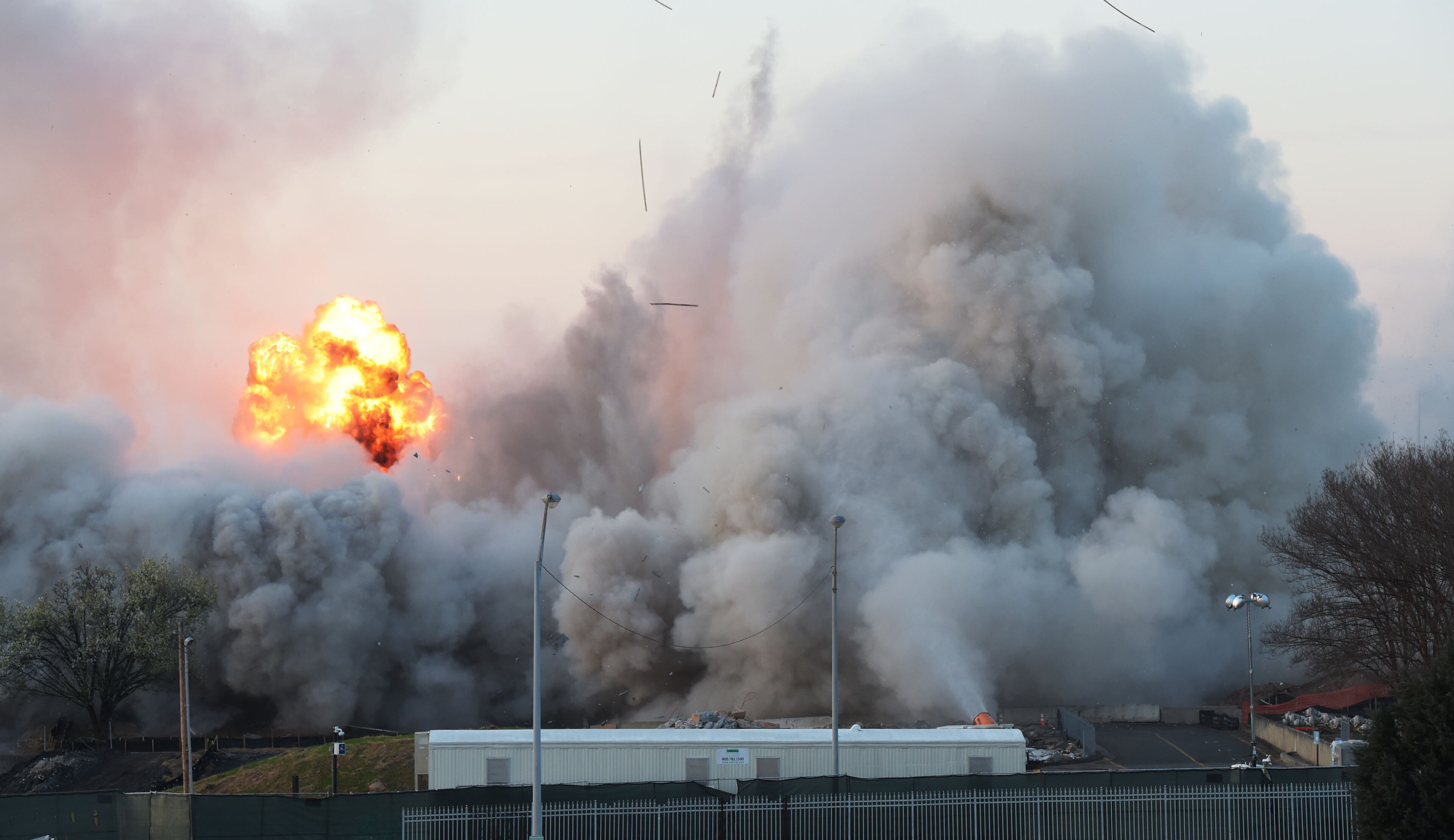 MARCH 5, 2017 7:05:12 AM ATLANTA A fireball erupts as demolition crews bring down the old state archives building in a controlled implosion shortly after 7 am Sunday, March 5, 2017. The 14 story state archives building was about 50 years old and was imploded to make way for a new state courts building. Gov. Deal has budgeted about $105 million in next year's budget for the new state courts building. Kent D. Johnson/AJC