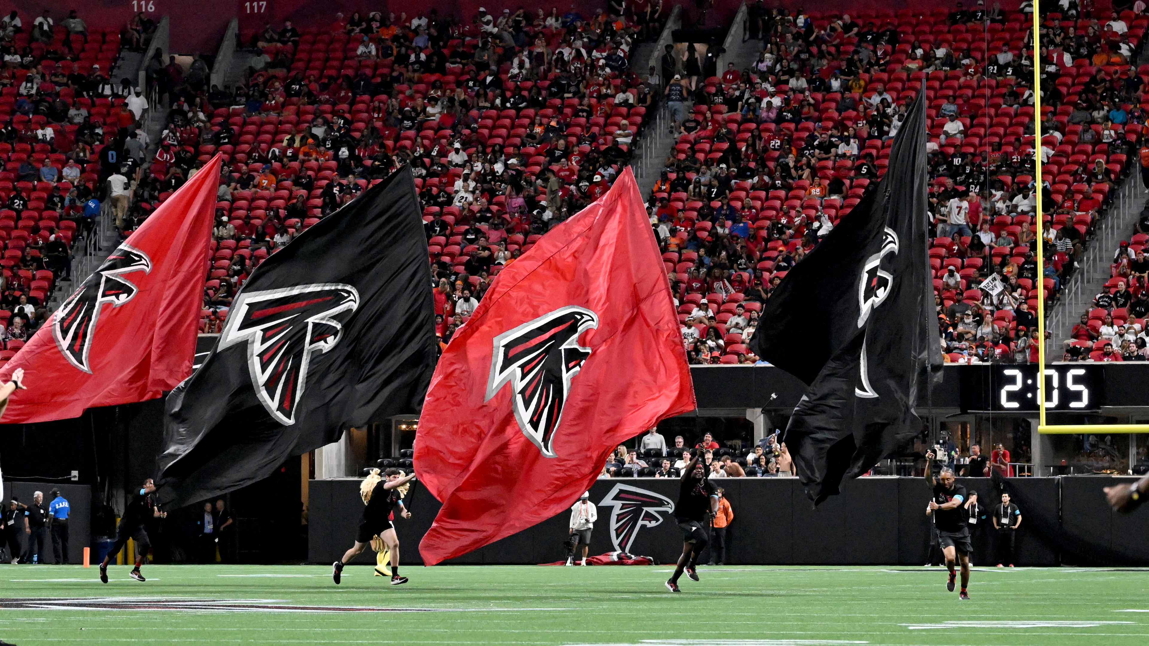 Falcons fans cheer after a touchdown by running back Tyler Goodson during the second half of an NFL preseason game at Mercedes-Benz Stadium on Friday, Aug. 14, 2026, in Atlanta. (Hyosub Shin/AJC)