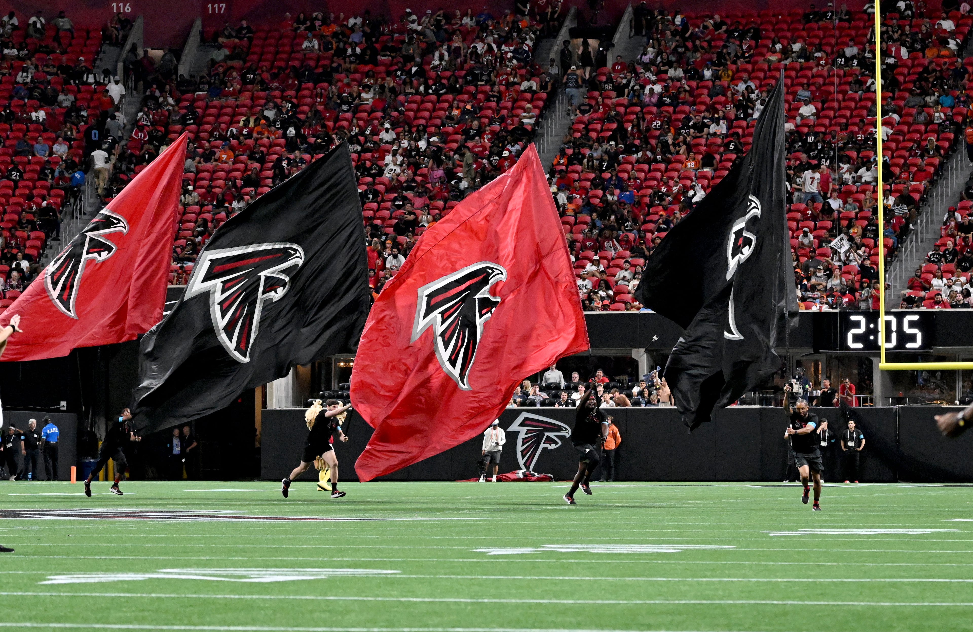 Falcons fans cheer after a touchdown by running back Tyler Goodson during their preseason game against the Denver Broncos at Mercedes-Benz Stadium on Friday, Aug. 14, 2026, in Atlanta. (Hyosub Shin/AJC)