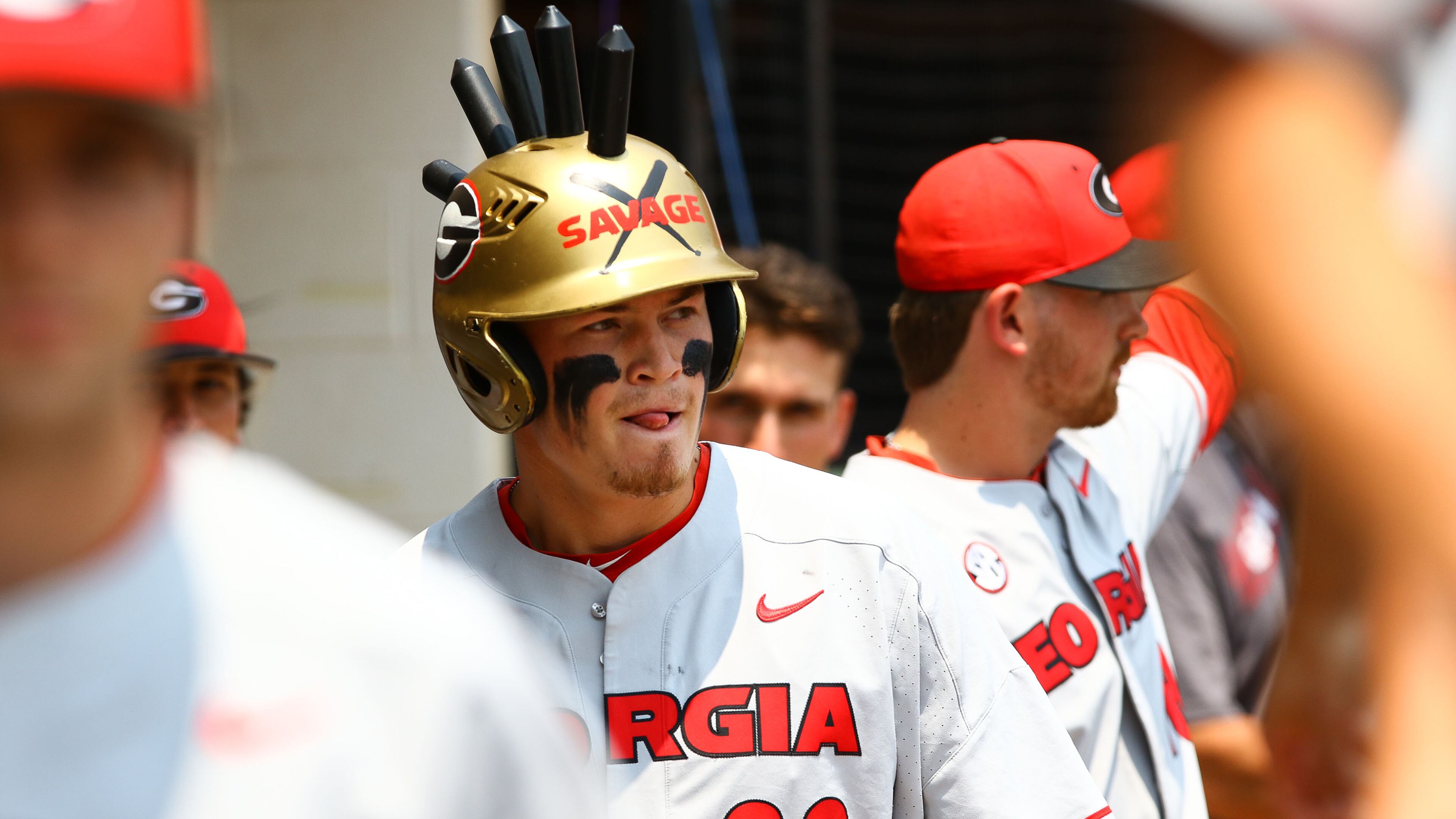 Georgia infielder Aaron Schunk (22) dons the "Savage Helmet" during the NCAA regional baseball game against Florida Atlantic Sunday, June 2, 2019, at Foley Field in Athens. Schunk hit two homers Sunday — including a grand slam in the eighth inning.