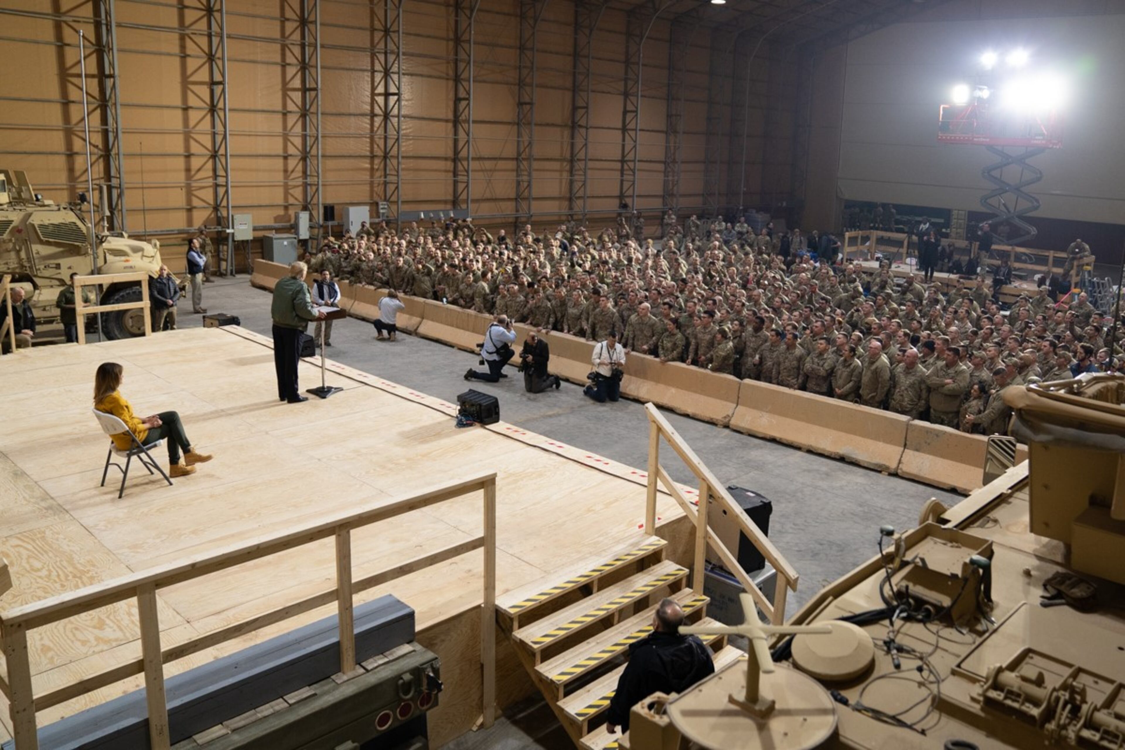 President Donald J. Trump, joined by First Lady Melania Trump, addresses his remarks to U.S. troops Wednesday, December 26, 2018, at the Al-Asad Airbase in Iraq.