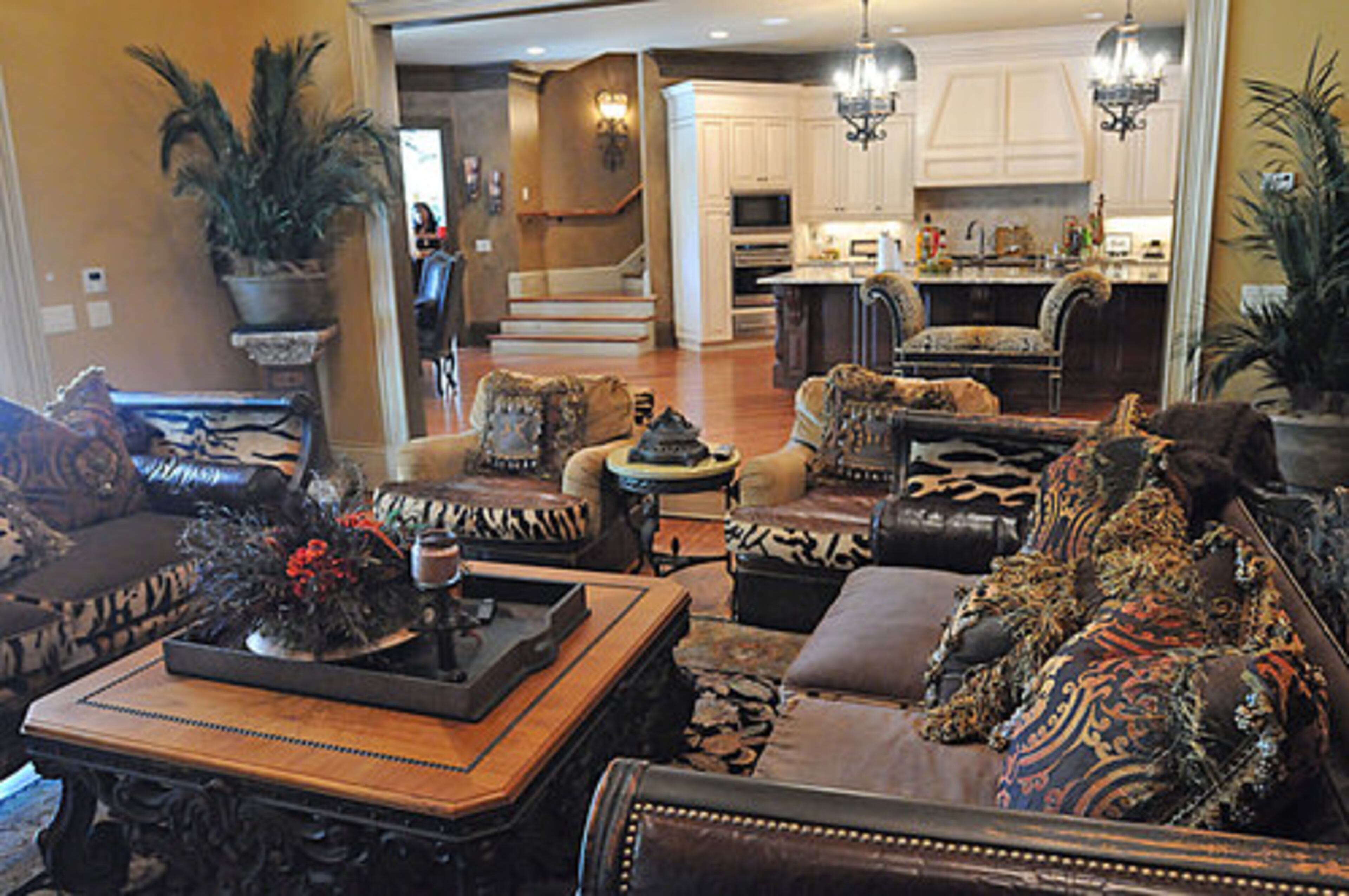 The open floor plan has this lavish seating area which flows nicely into the kitchen and dining room.