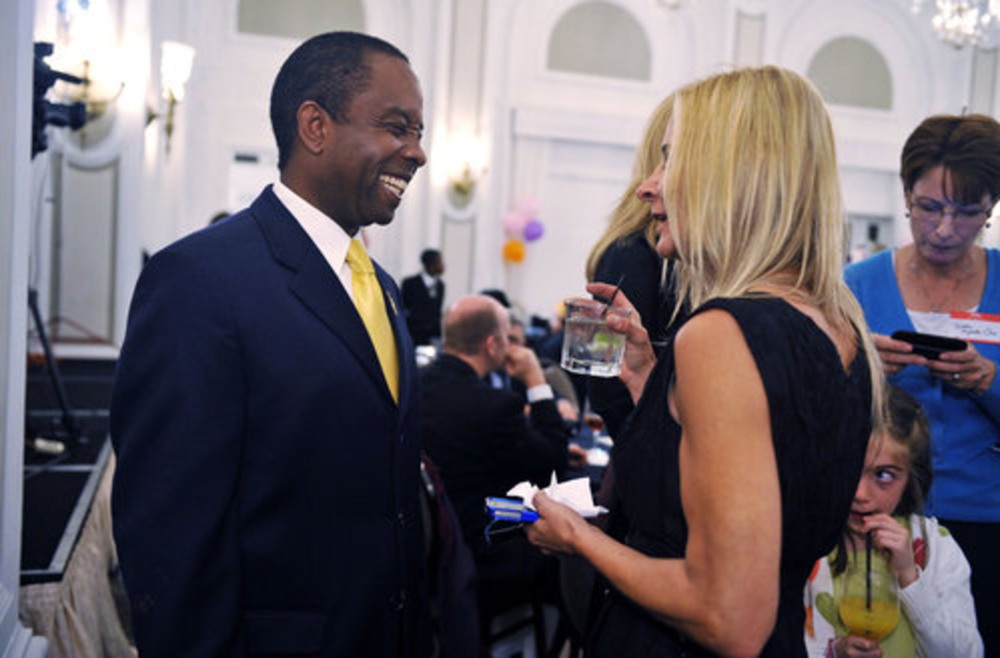 Libertarian candidate for governor John Monds (left) speaks with supporter Rhonda Martini (right), former Libertarian candidate for lieutenant governor, during the Libertarian election night party at the Georgian Terrace Hotel in Midtown Tuesday, November 2, 2010.