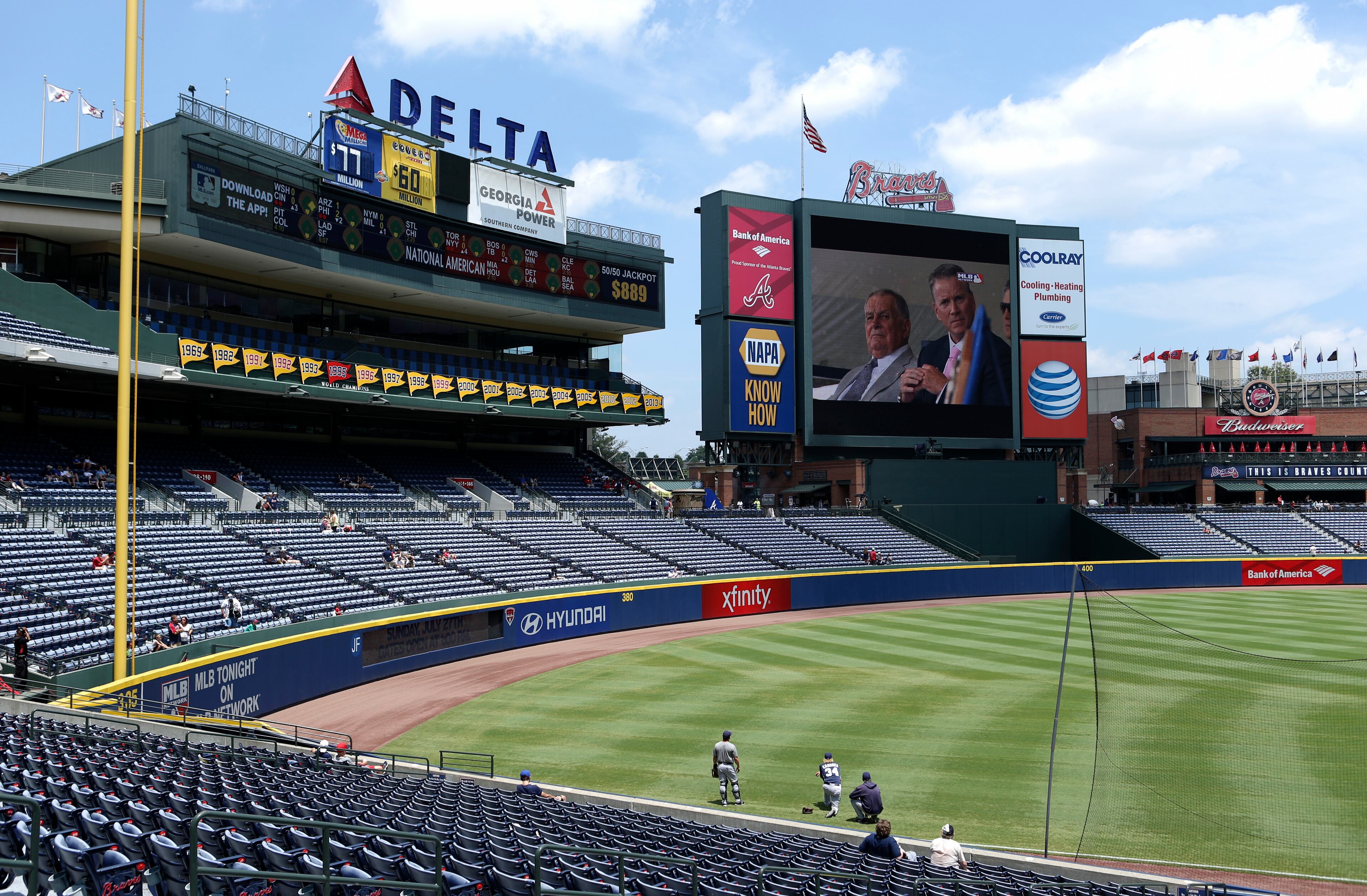 Former Atlanta Braves manager Bobby Cox and former pitcher Tom Glavine are shown on BravesVision during the Hall of Fame ceremony before the start of their game against the San Diego Padres at Turner Field Sunday afternoon in Atlanta, Ga., July 27, 2014. JASON GETZ / SPECIAL
