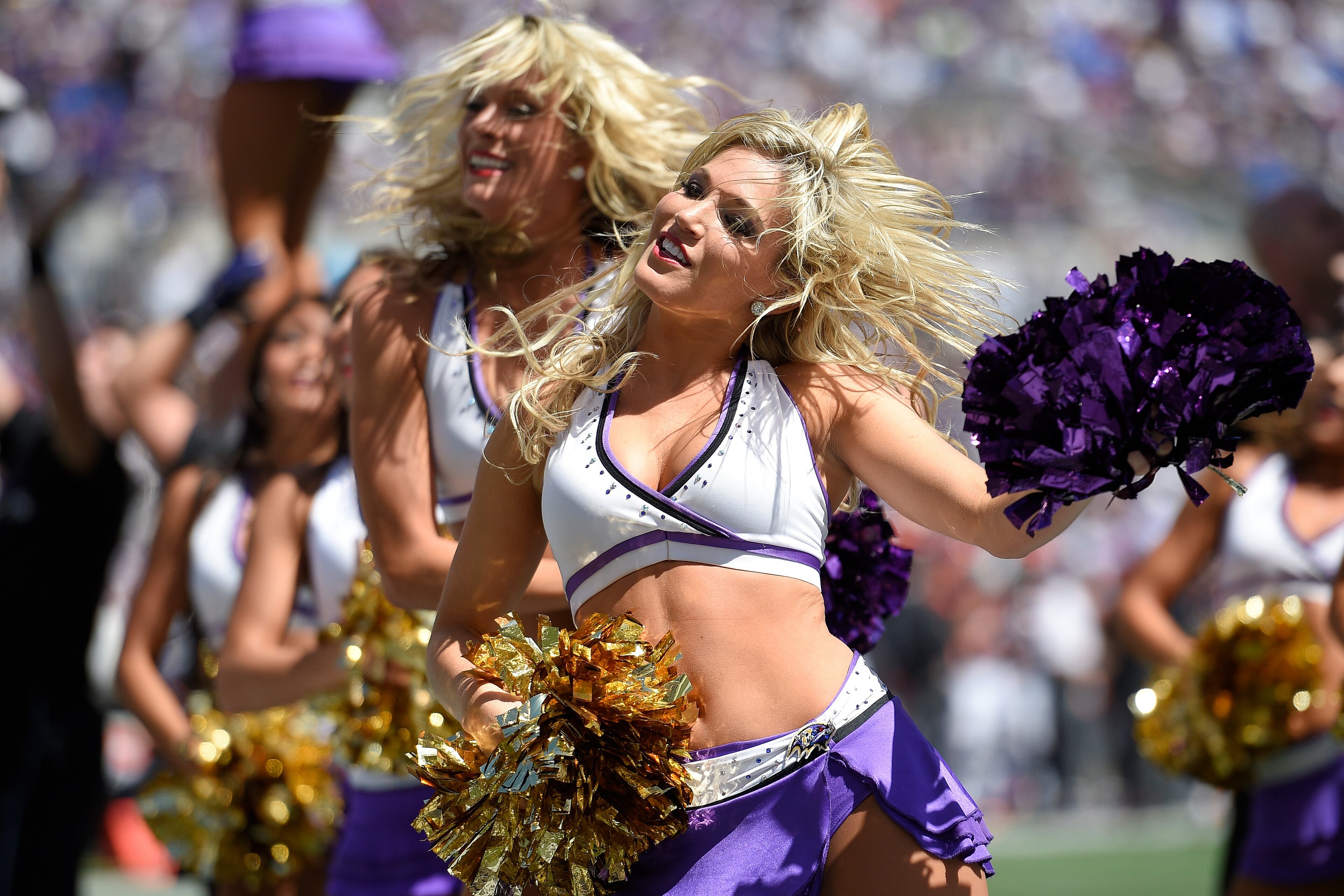 The Baltimore Ravens cheerleaders perform during the first half of an NFL football game against the Cincinnati Bengals in Baltimore, Md., Sunday, Sept. 7, 2014. (AP Photo/Nick Wass)