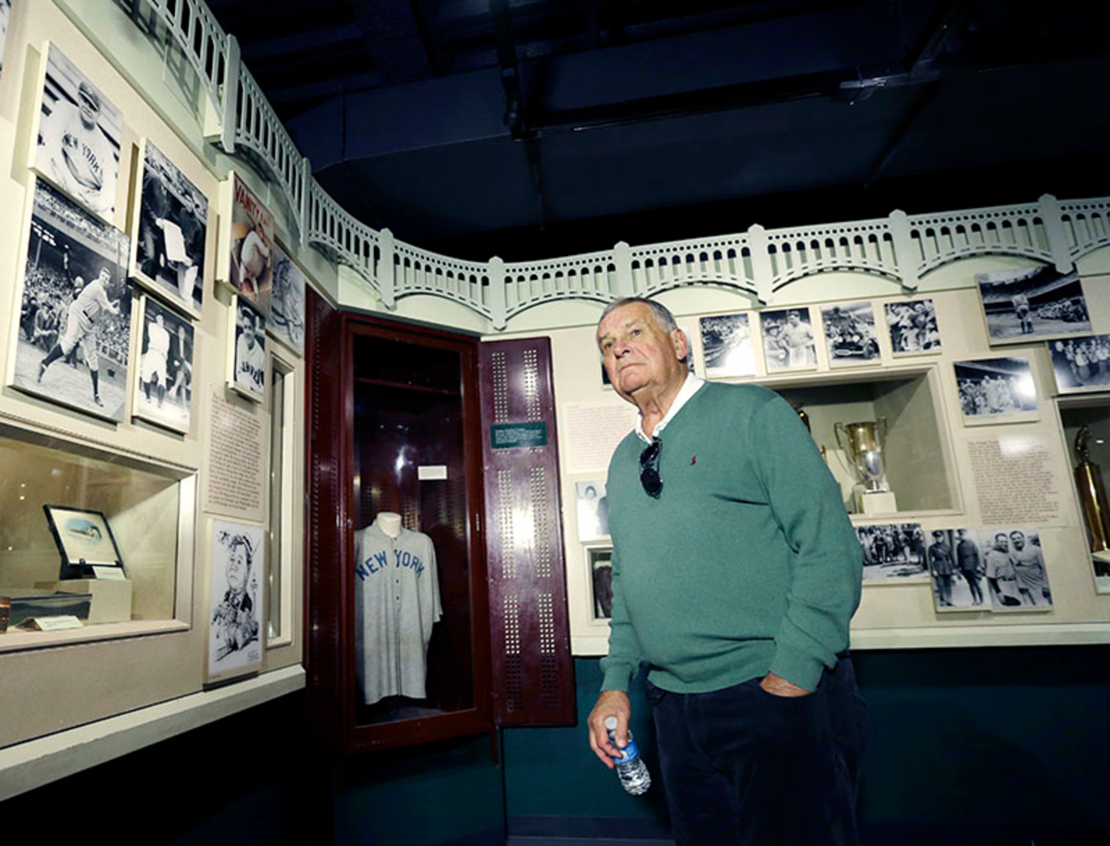 Former Atlanta Braves manager Bobby Cox visits a Babe Ruth exhibit during his orientation visit at the Baseball Hall of Fame on Monday, March 24, 2014, in Cooperstown, N.Y. Cox said the exhibit was one that stood out the most during his tour.