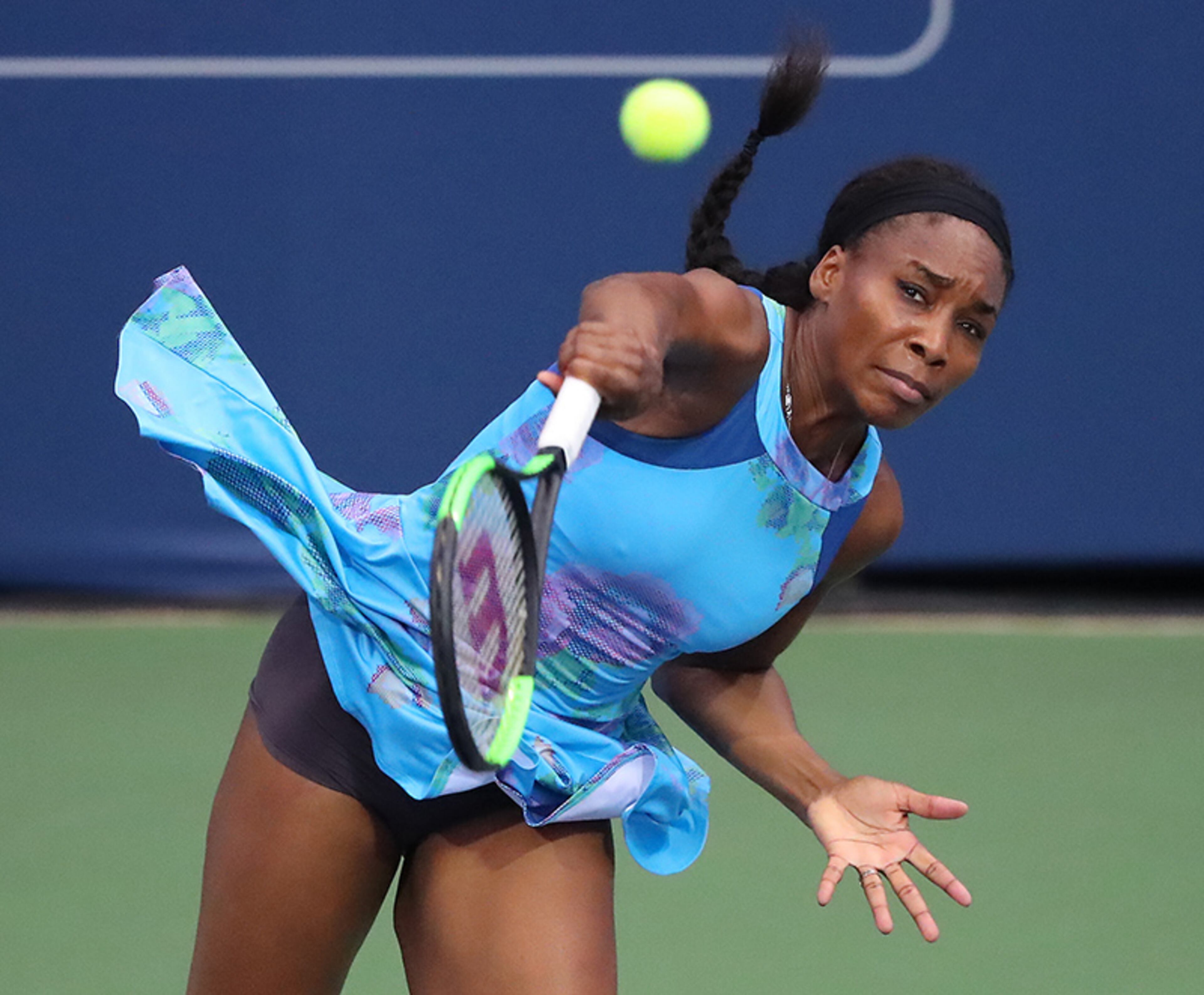 July 23, 2017 Atlanta: Grand Slam champion Venus Williams serves up a ace to Canada's No. 1 ranked player and Sports Illustrated swimsuit model Genie Bouchard in a special women's exhibition at the BB&T Atlanta Open Tournament on Sunday, July 23, 2017, in Atlanta. Curtis Compton/ccompton@ajc.com