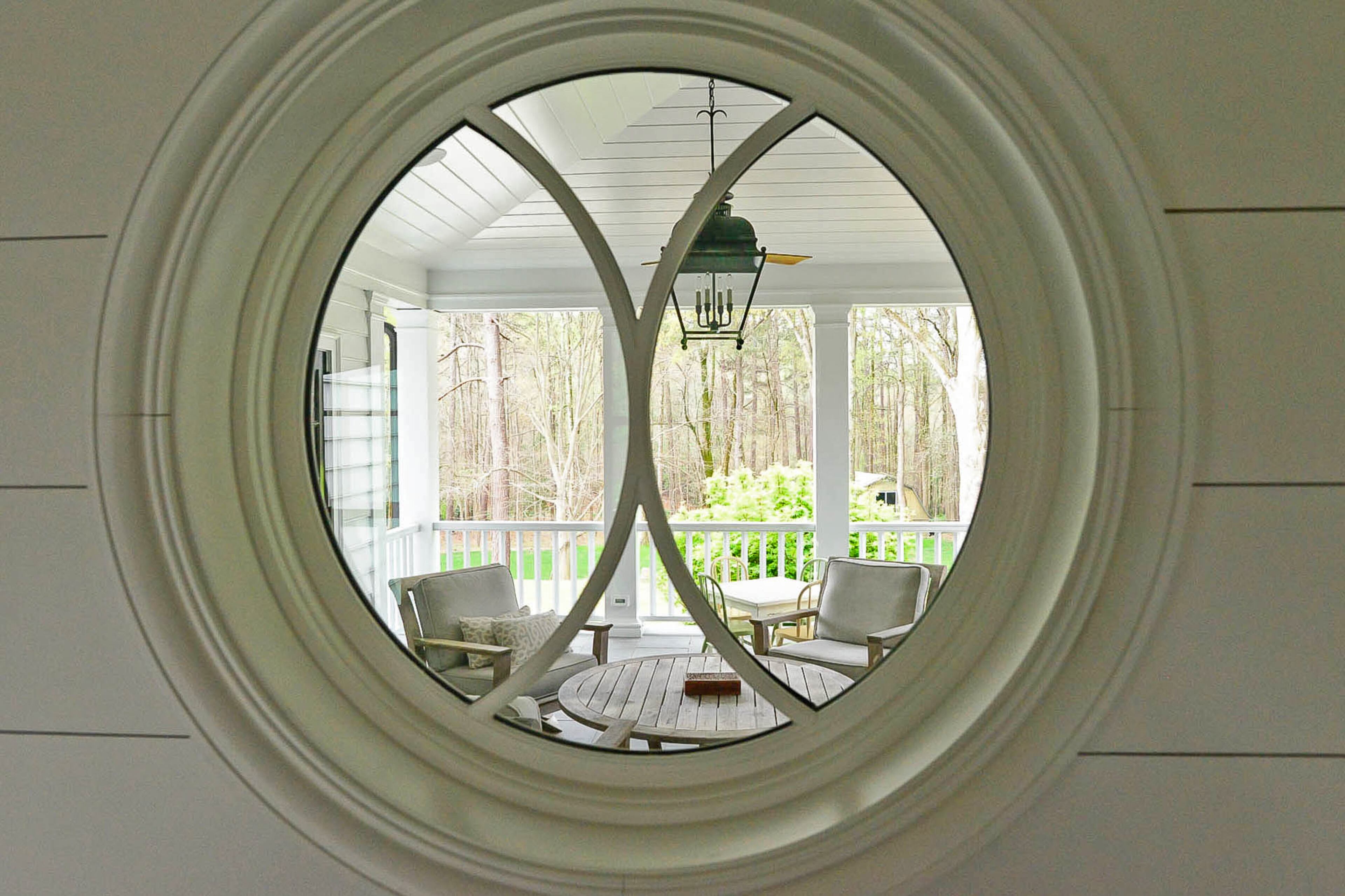 Through the circular window of the Virginia farmhouse-style home, homeowner Ellen Turner said its possible to see all the way from the front yard to the back porch. Contributed by Christopher Oquendo