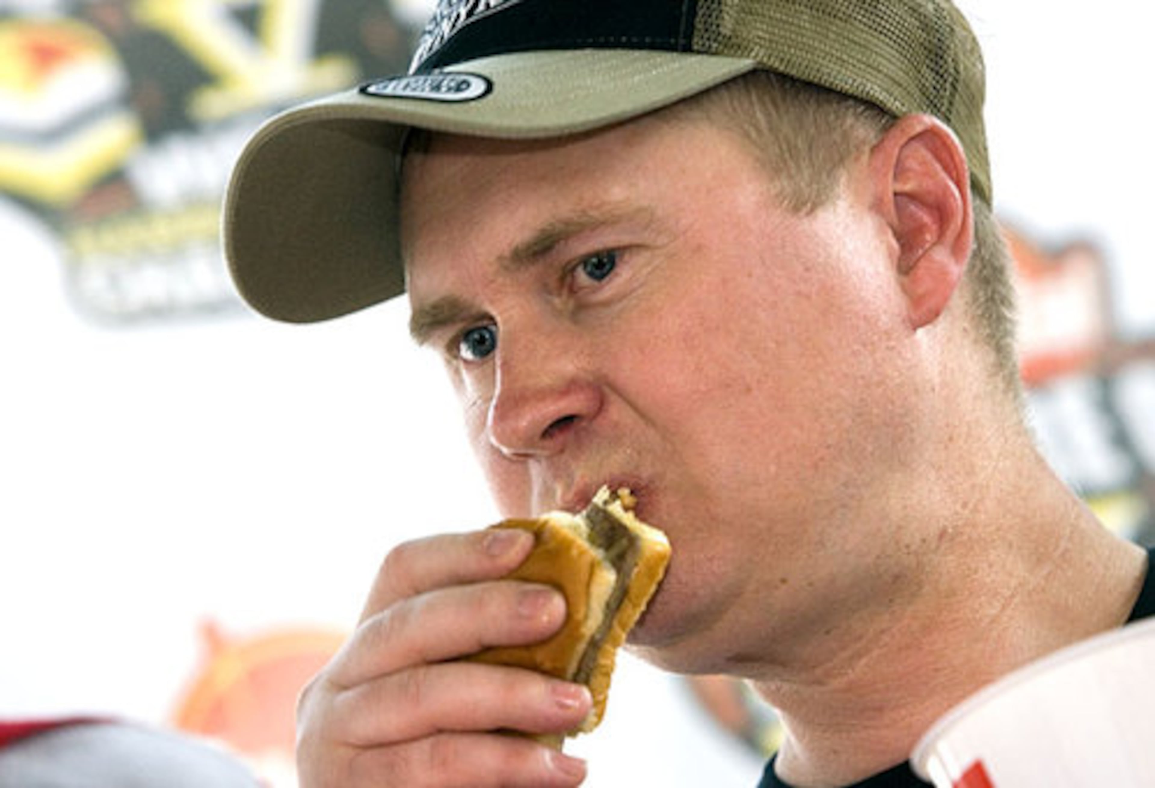 The Georgia qualifying round of the Krystal Square Off V World Hamburger Eating Championship was held Saturday at Lenox Square and some serious eaters turned out for the competition. Here, Jason Birch of White packs 'em away. Birch's name was drawn from a pool of last-minute entrants.