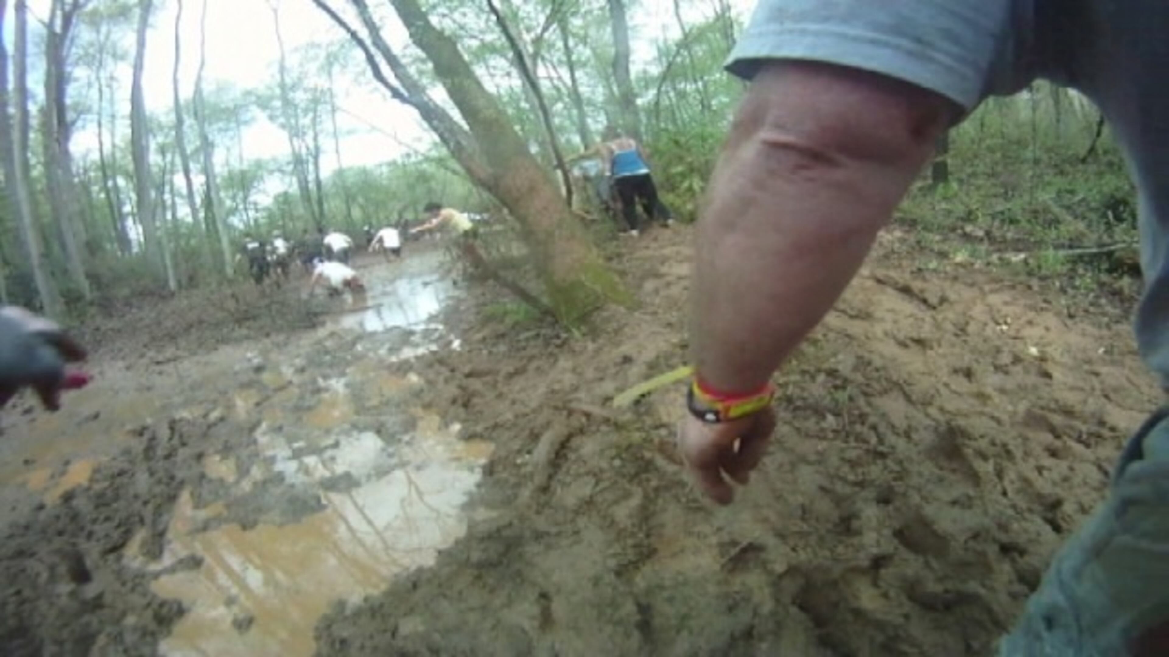 Runners battled mud, fire and barbed wire to compete in the Spartan Race at the National Whitewater Center in Charlotte.